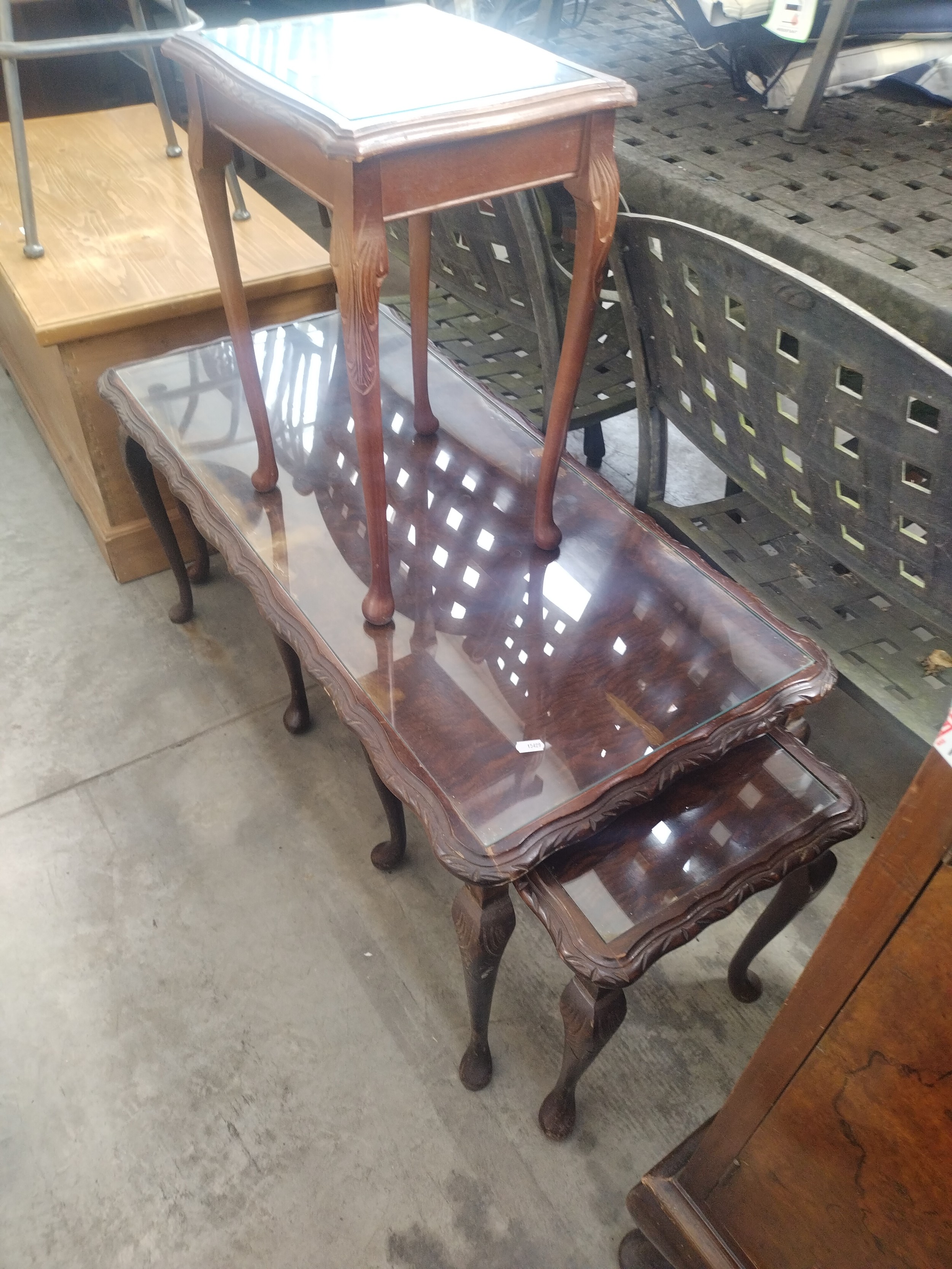 A vintage glass topped walnut coffee table with 2 x nested occasional tables