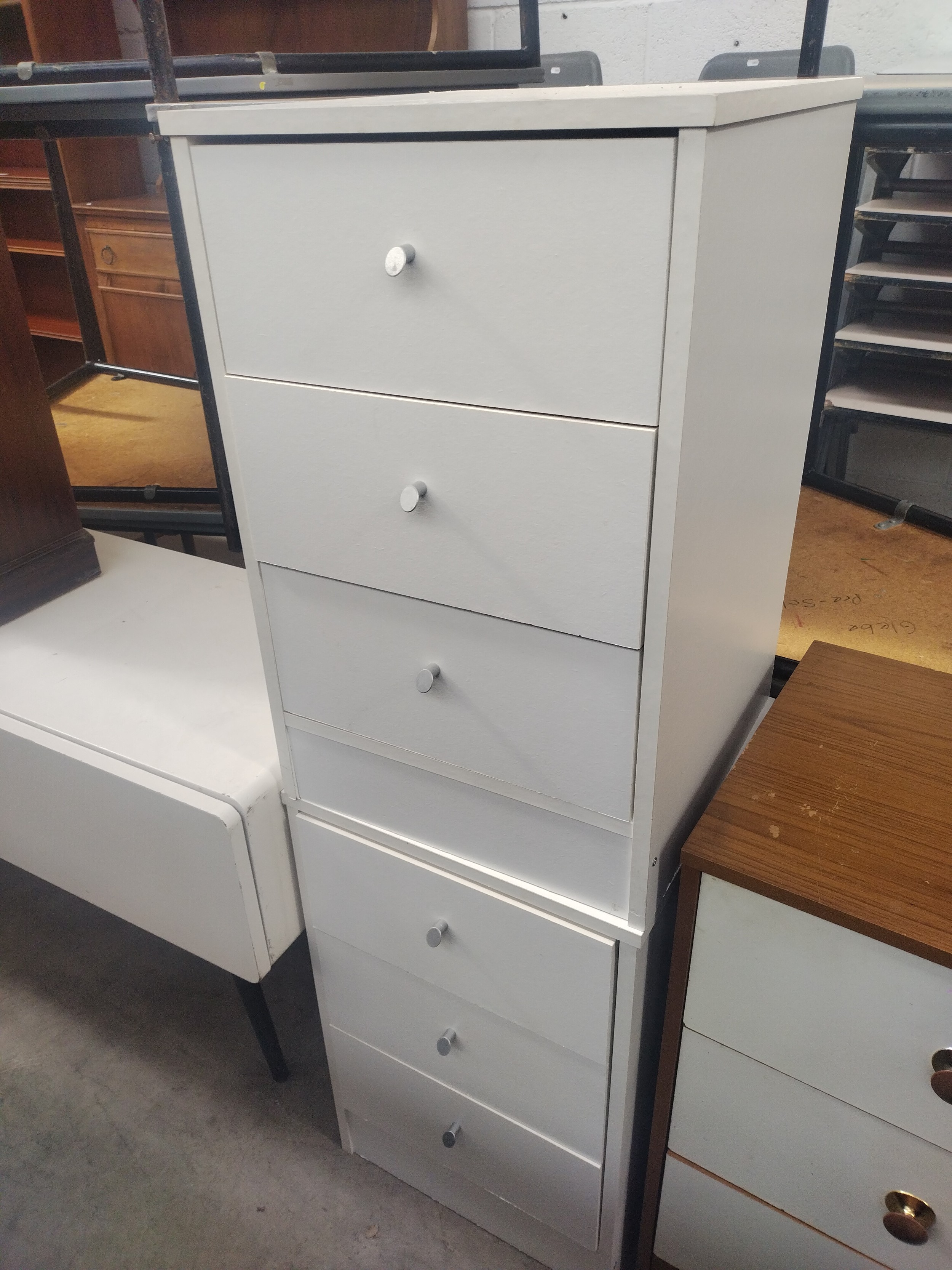A pair of 3 drawer bedside chests