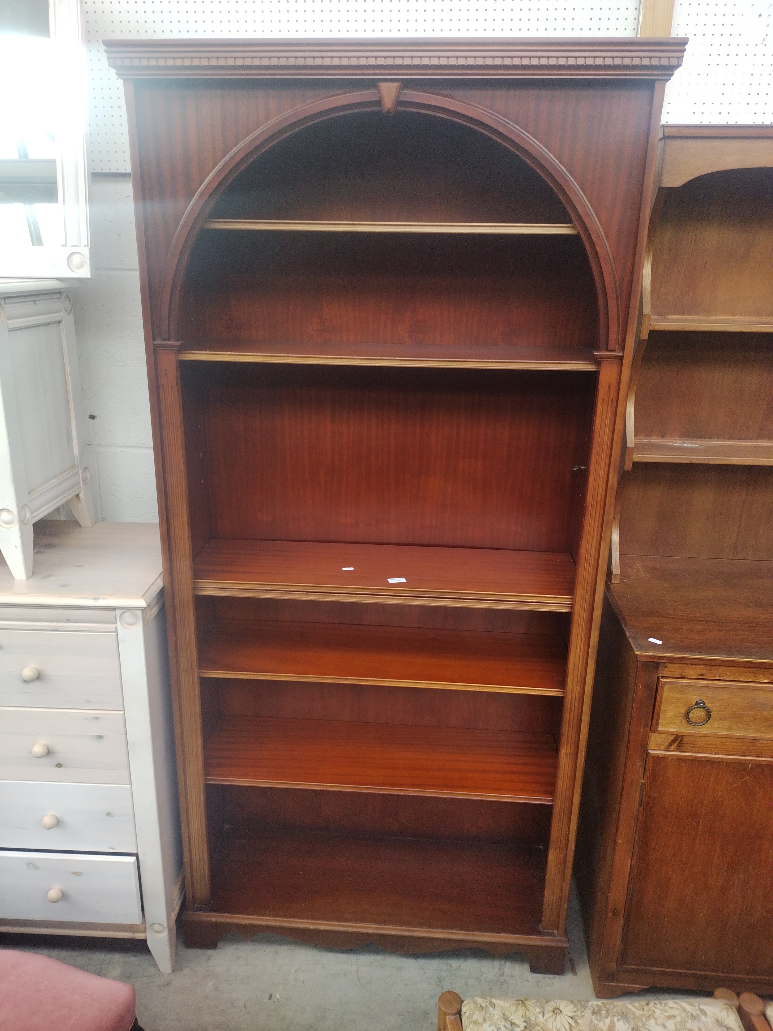 A large vintage mahogany open shelf unit