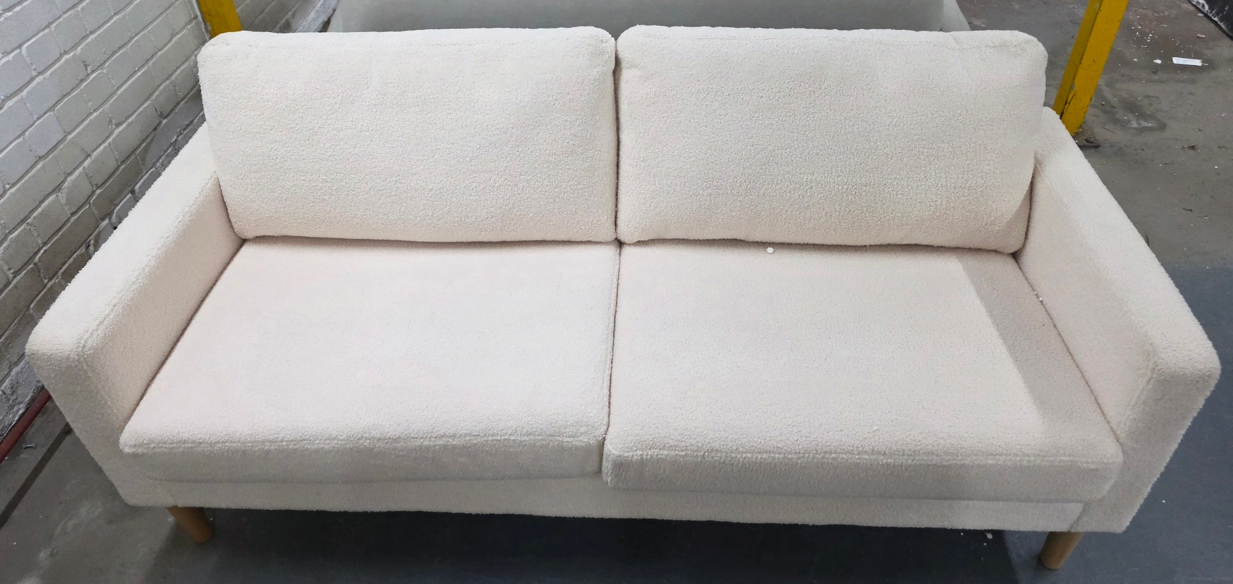 Modernist white two seater sofa *Collection from the vendors address
