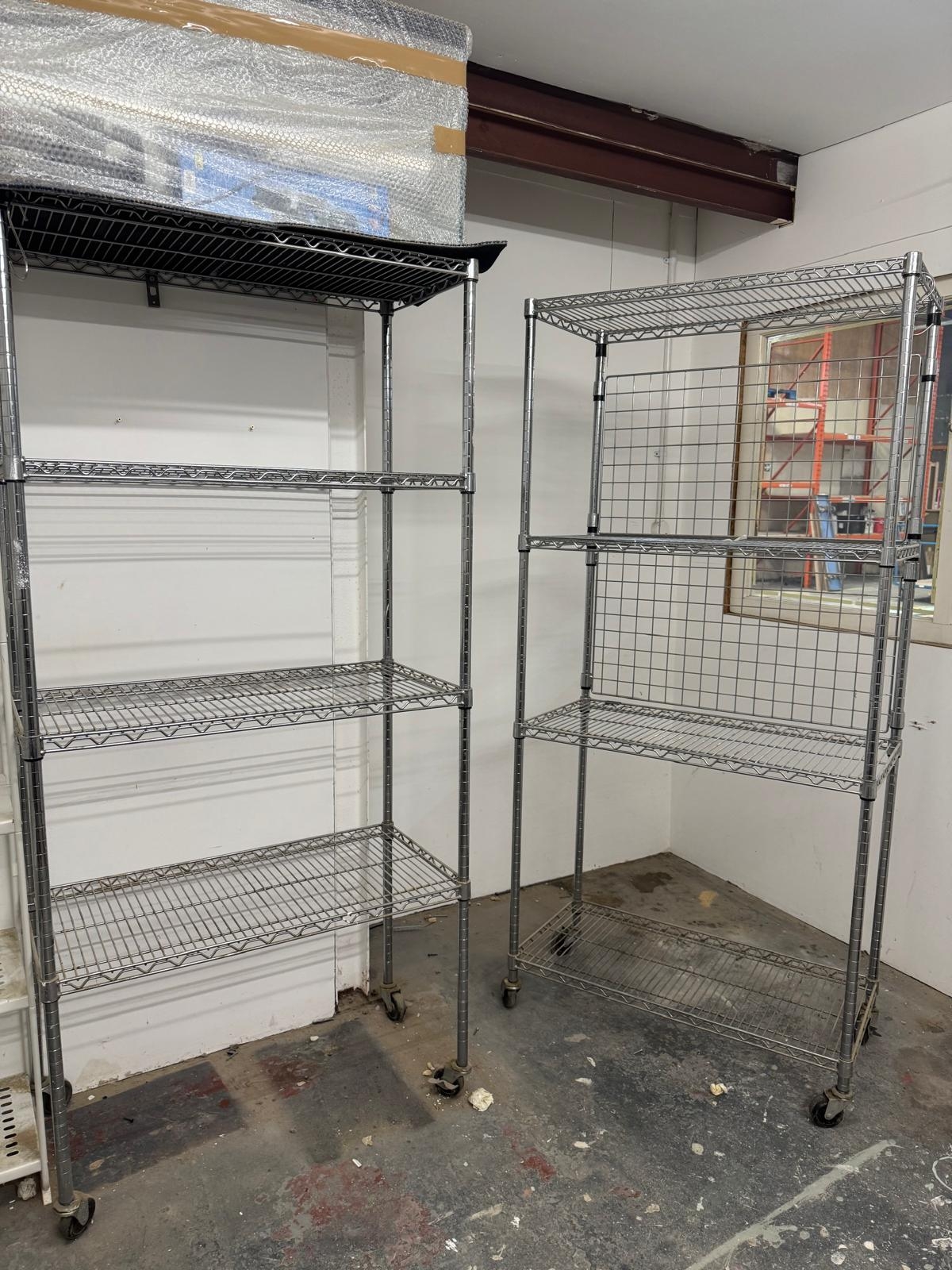 Pair of chrome shelves on castors 90 x 102cm