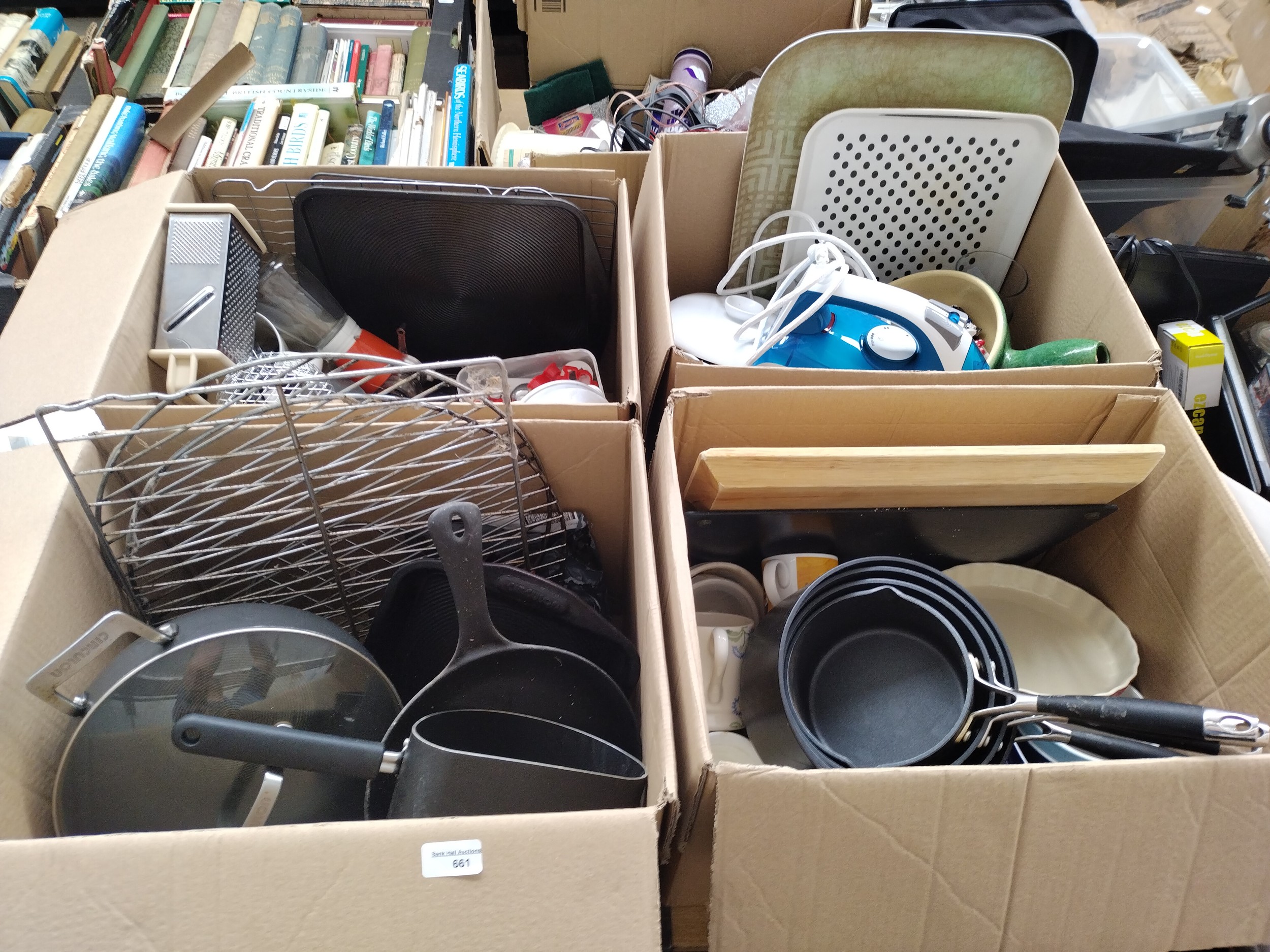 Four boxes inc pans, iron, mugs, baking tray serving trays, etc