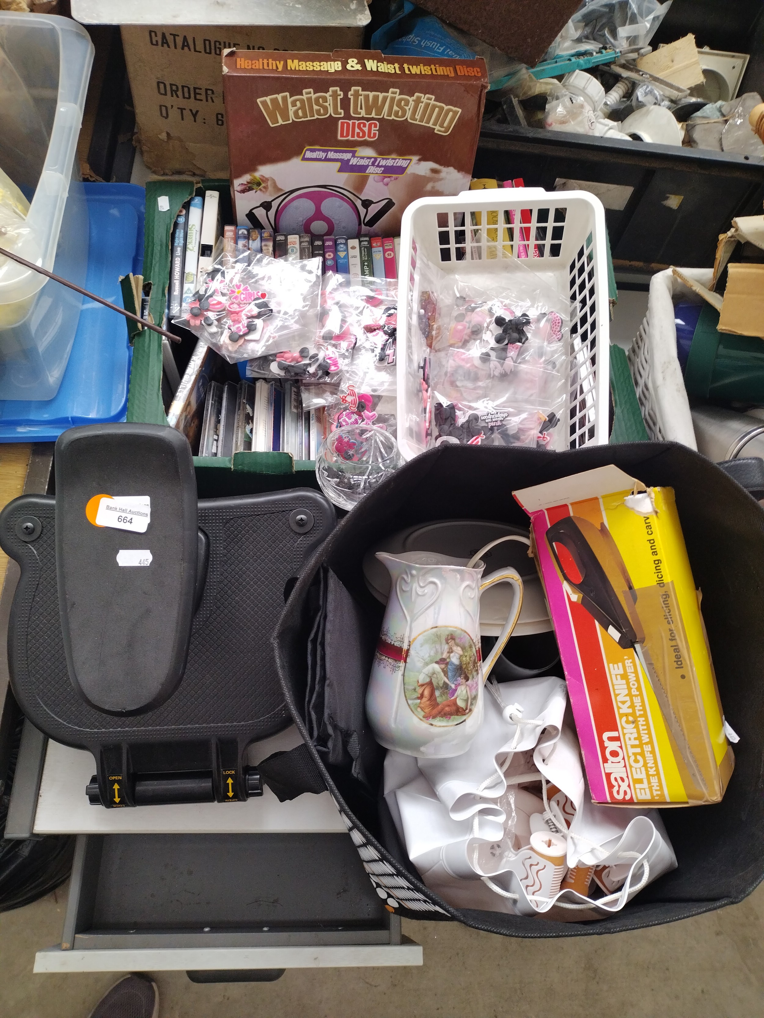 Lot inc DVDs, CDs, hair curlers, electric knife, etc