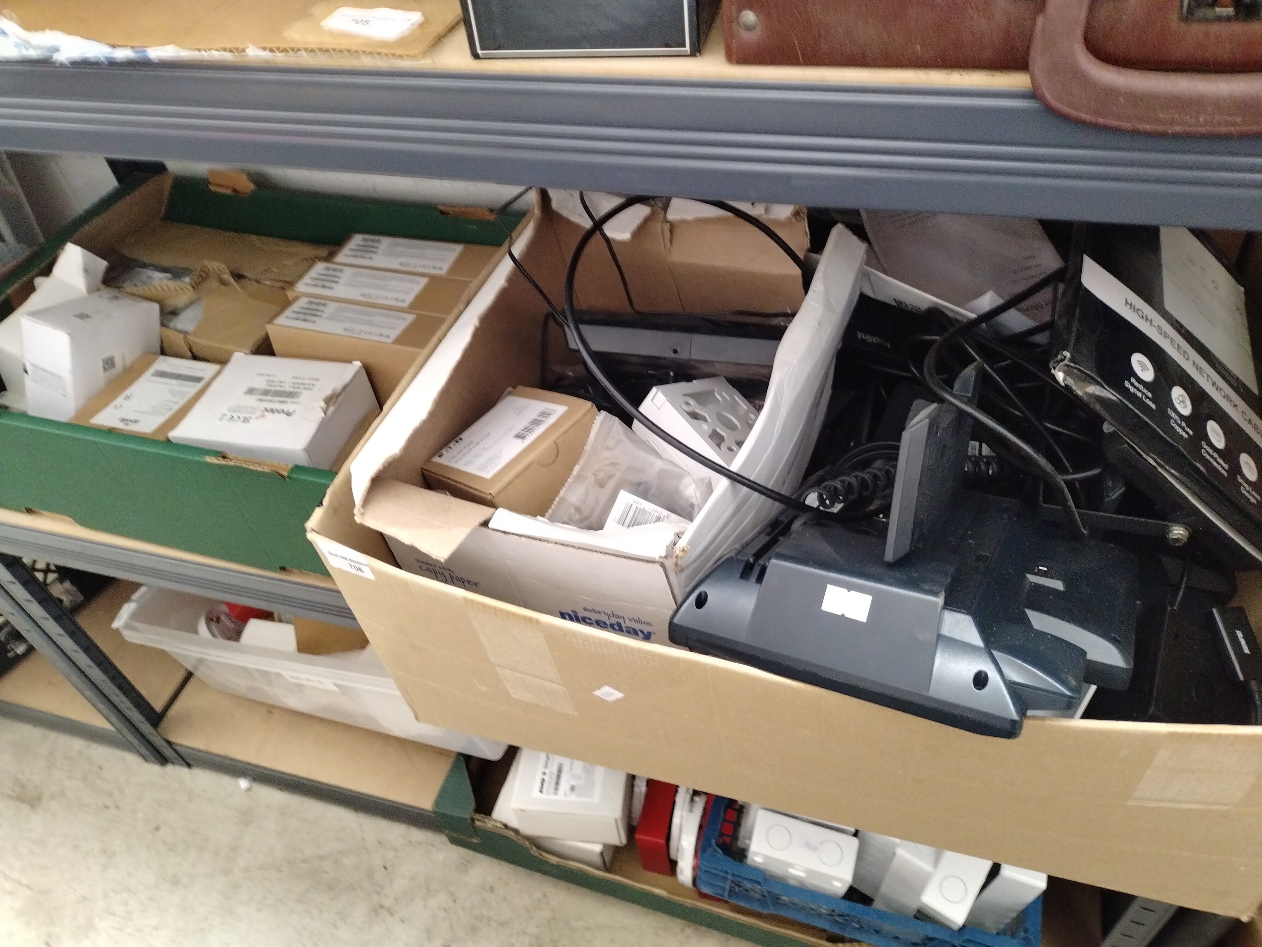 Two boxes of fire safety hardware