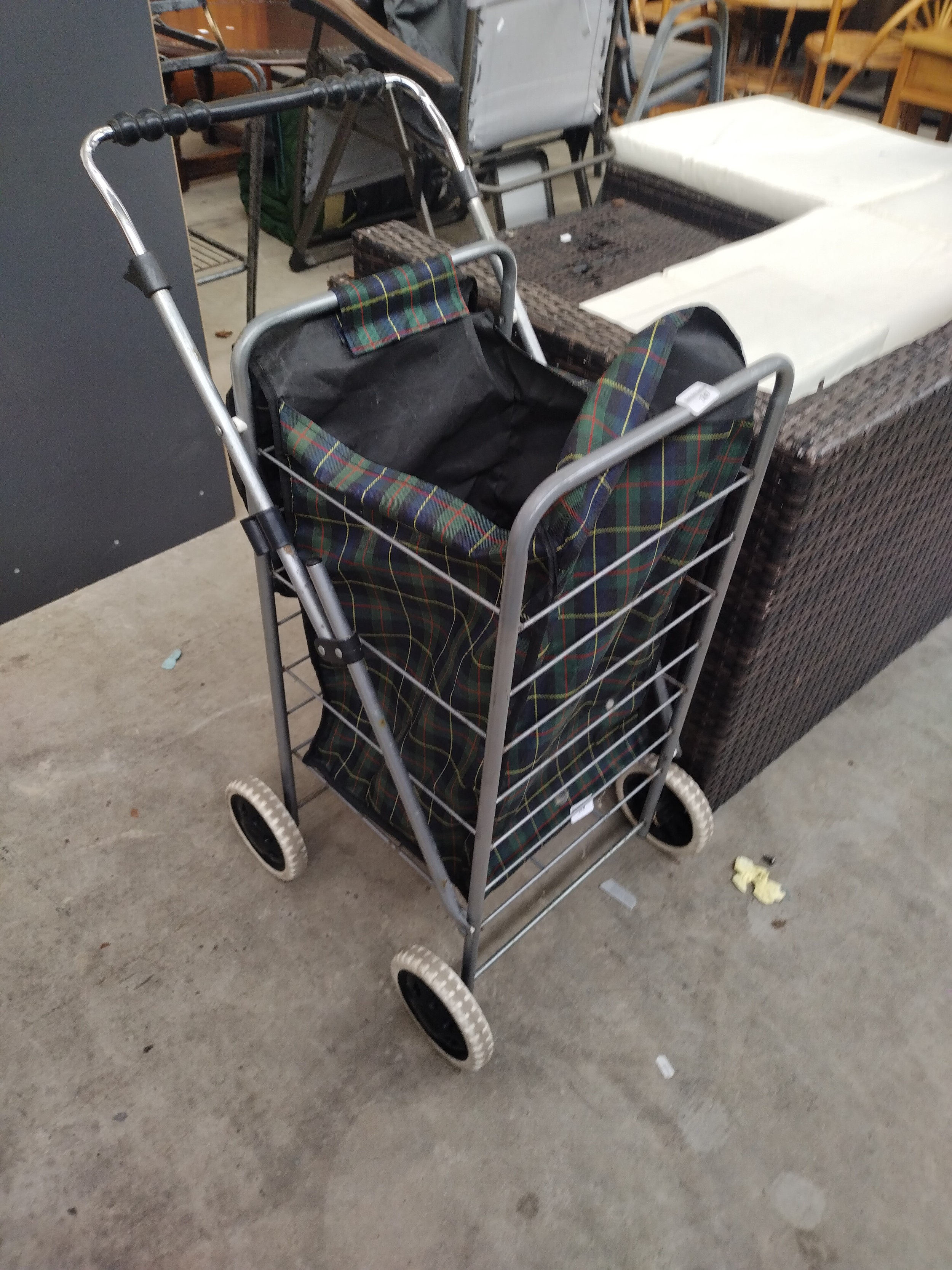 Fabric four wheeled shopping trolley
