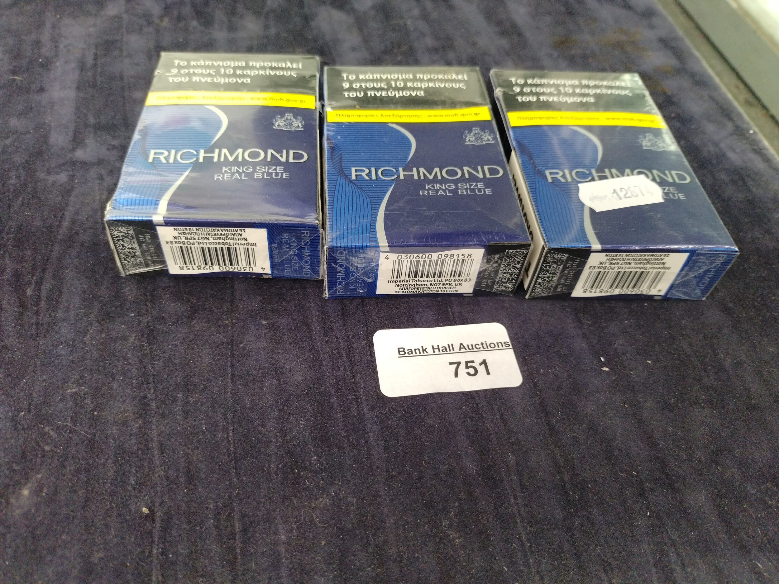 Three packs of Richmond Cigarettes