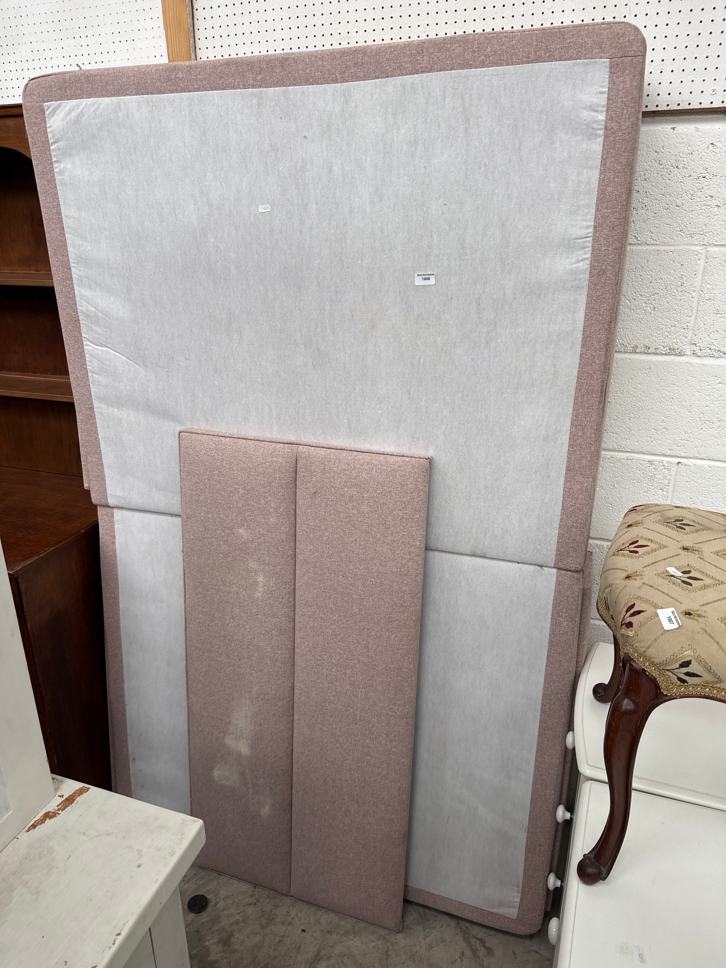 A 4ft divan bed base with matching headboard