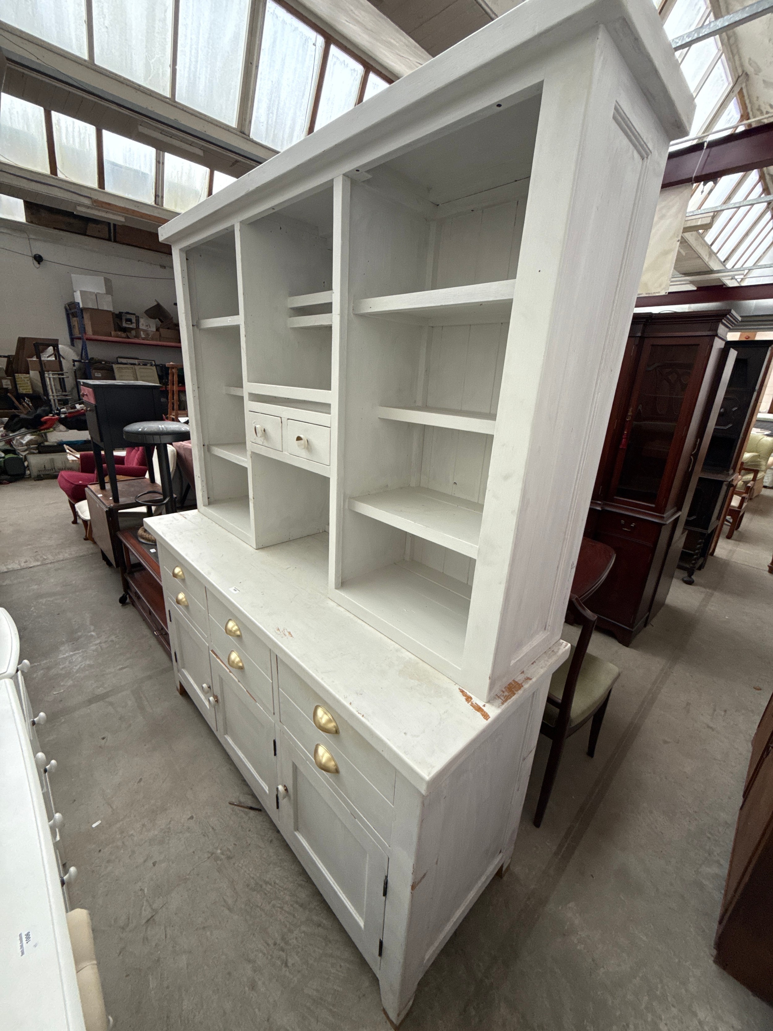 A large painted vintage dresser with 6 drawer base