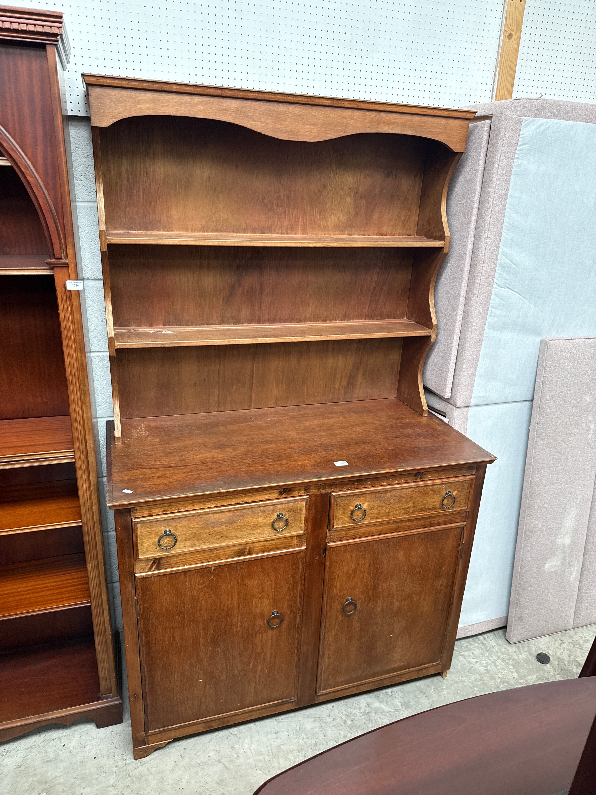 A vintage 2 drawer dresser with lower cupboards