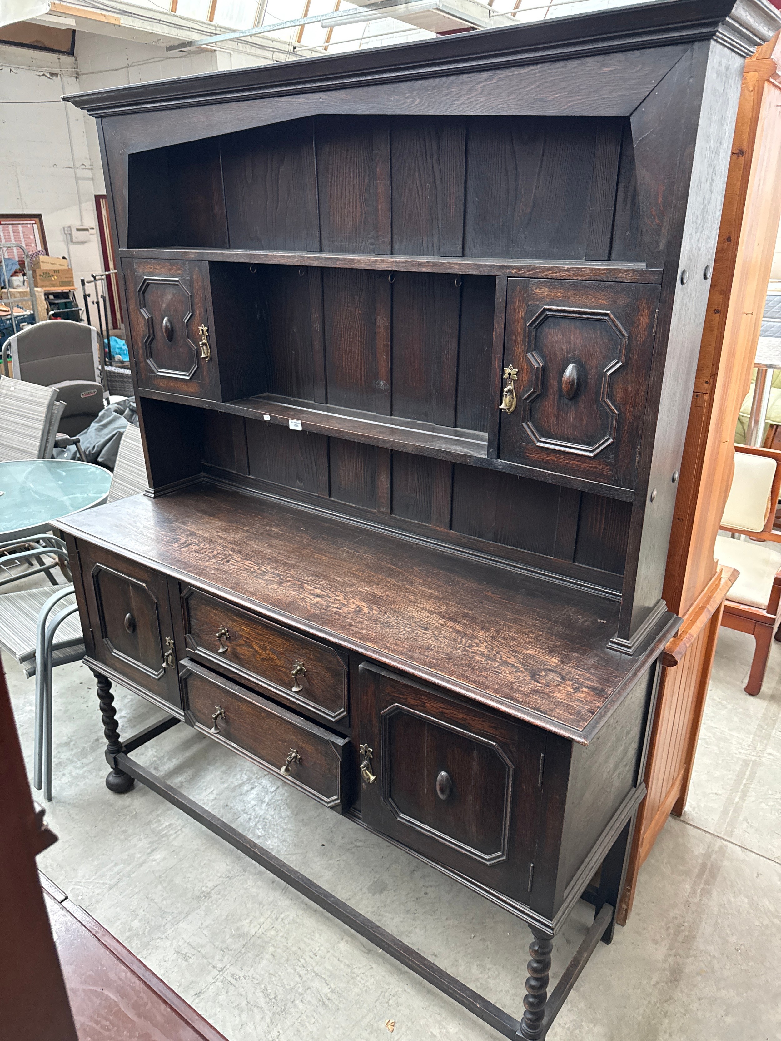 A large vintage oak Jacobean style dresser with 2 drawer base and Barley Twist