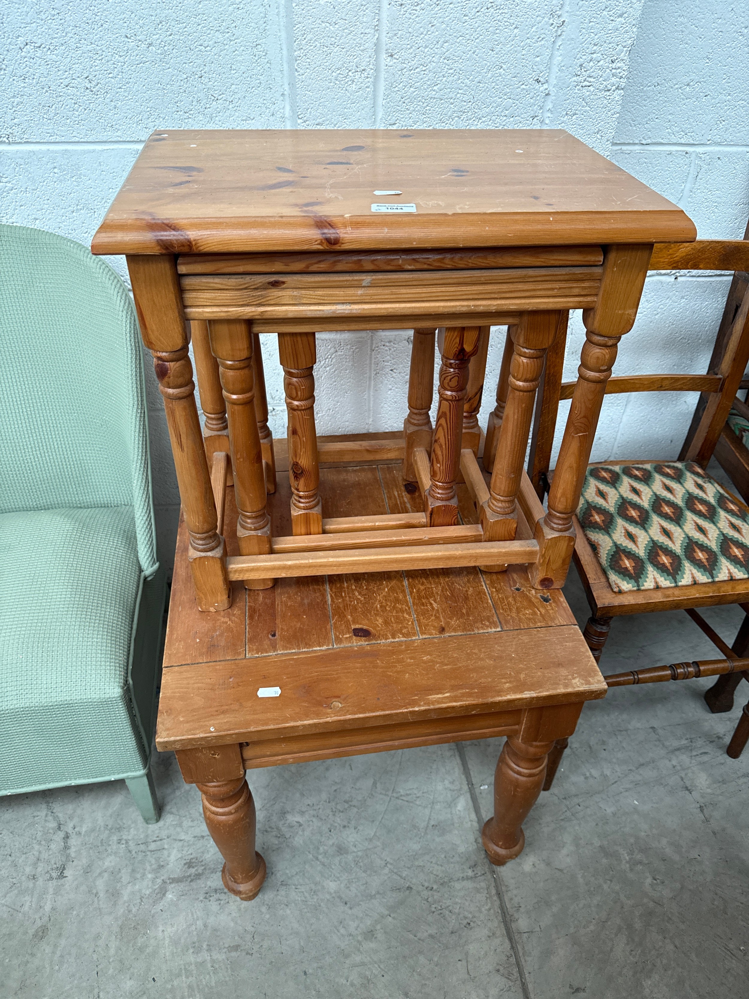 A nest of 3 x vintage knotty pine occasional tables and a small coffee table