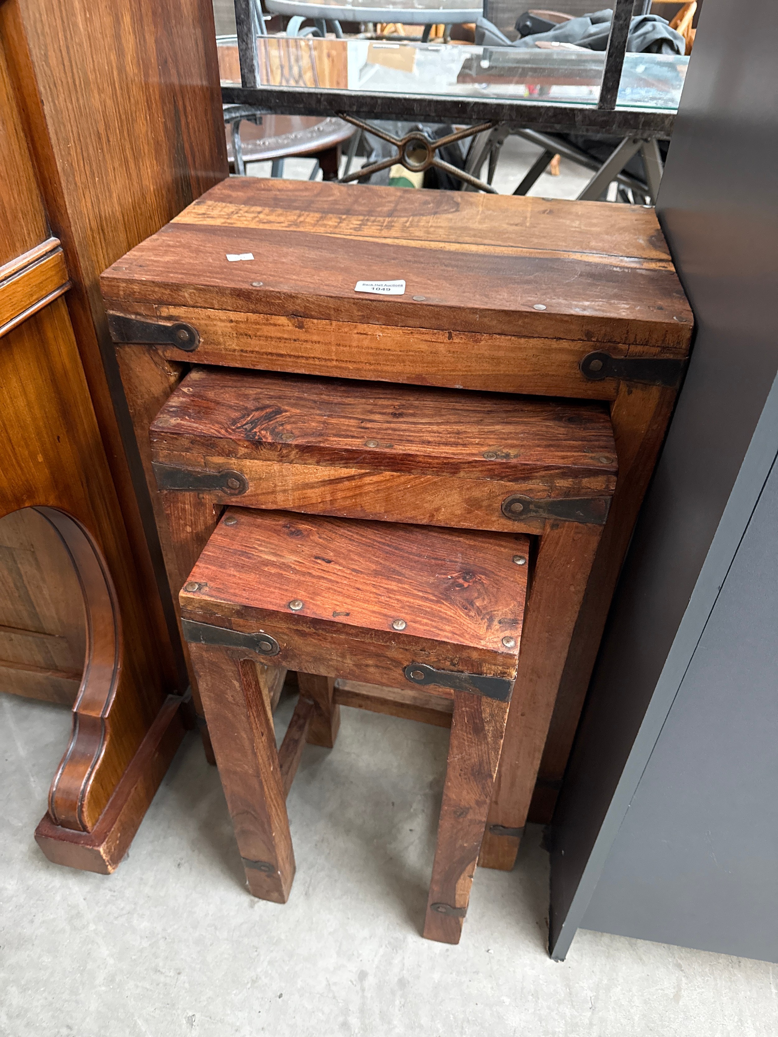 A nest of 3 x tall Sheesham style hardwood occasional tables