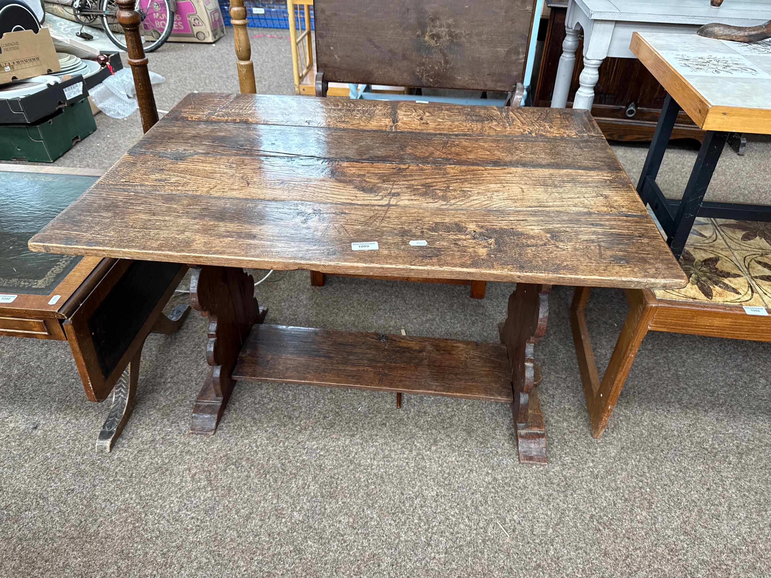 A small vintage refectory style side table