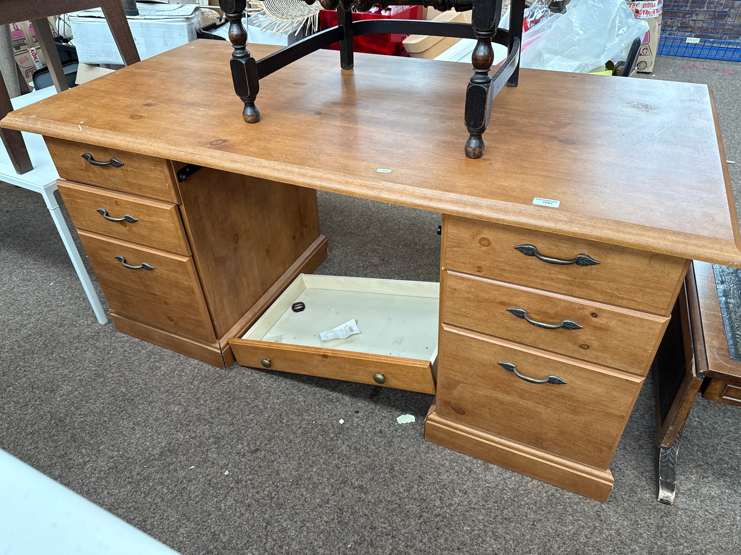 A large 5 drawer twin pedestal desk