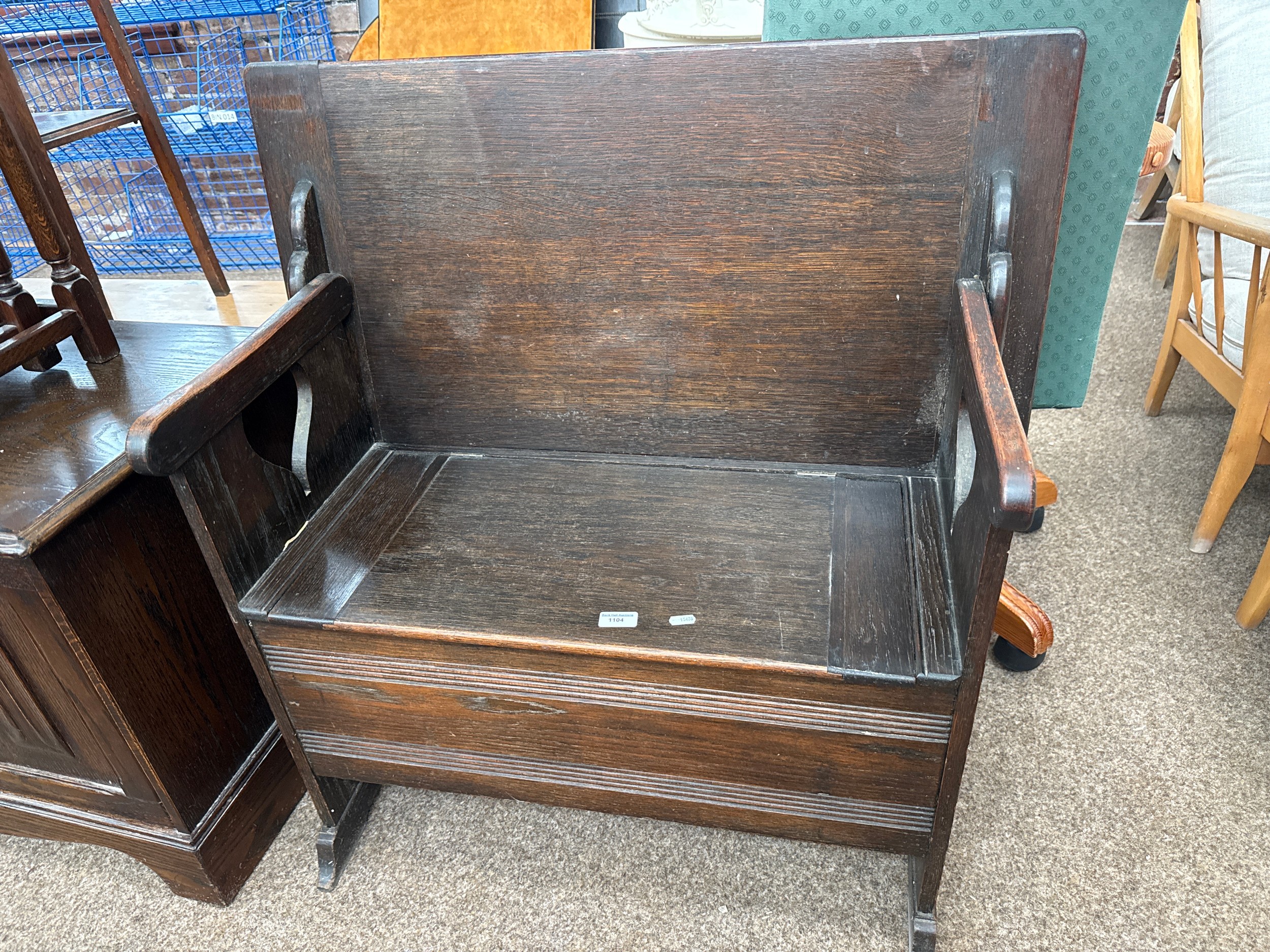 A small vintage Monk's Bench with under seat storage