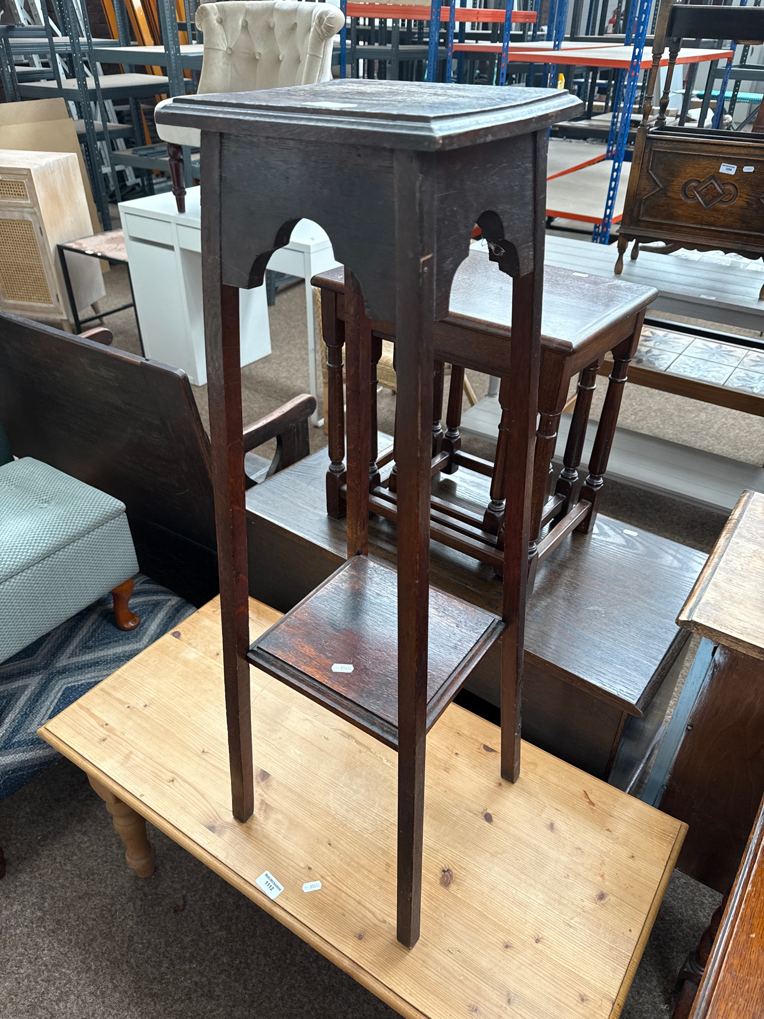 A vintage 2 tier plant stand