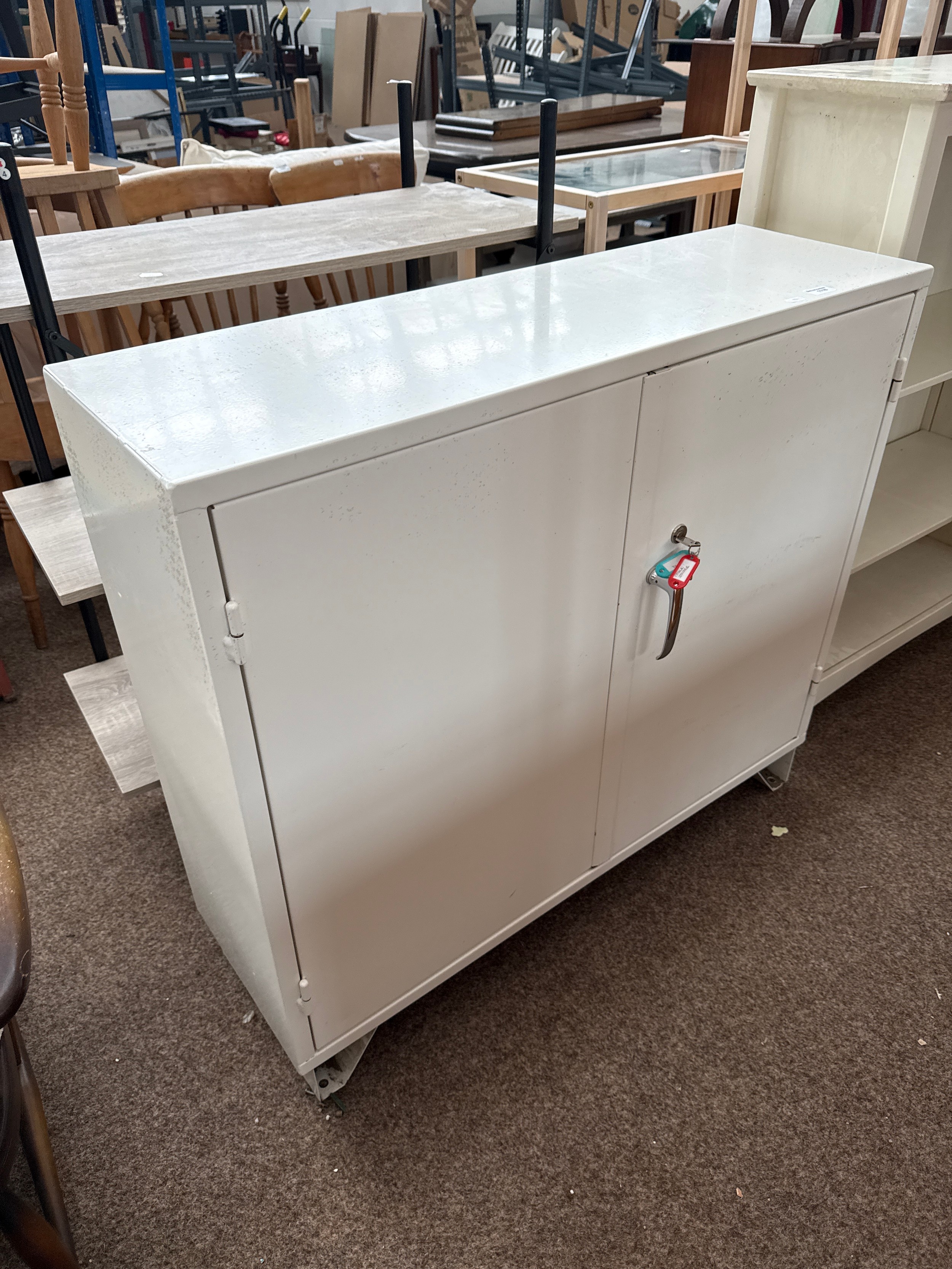 A 2 door lockable metal office cabinet