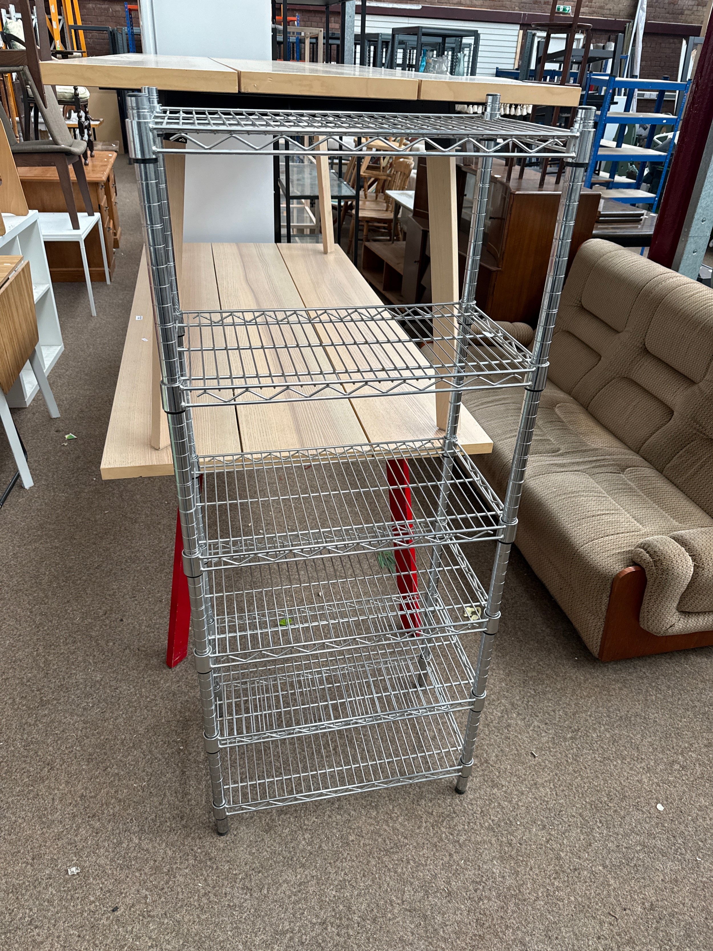 A 6 tier stacking metal shelf stand