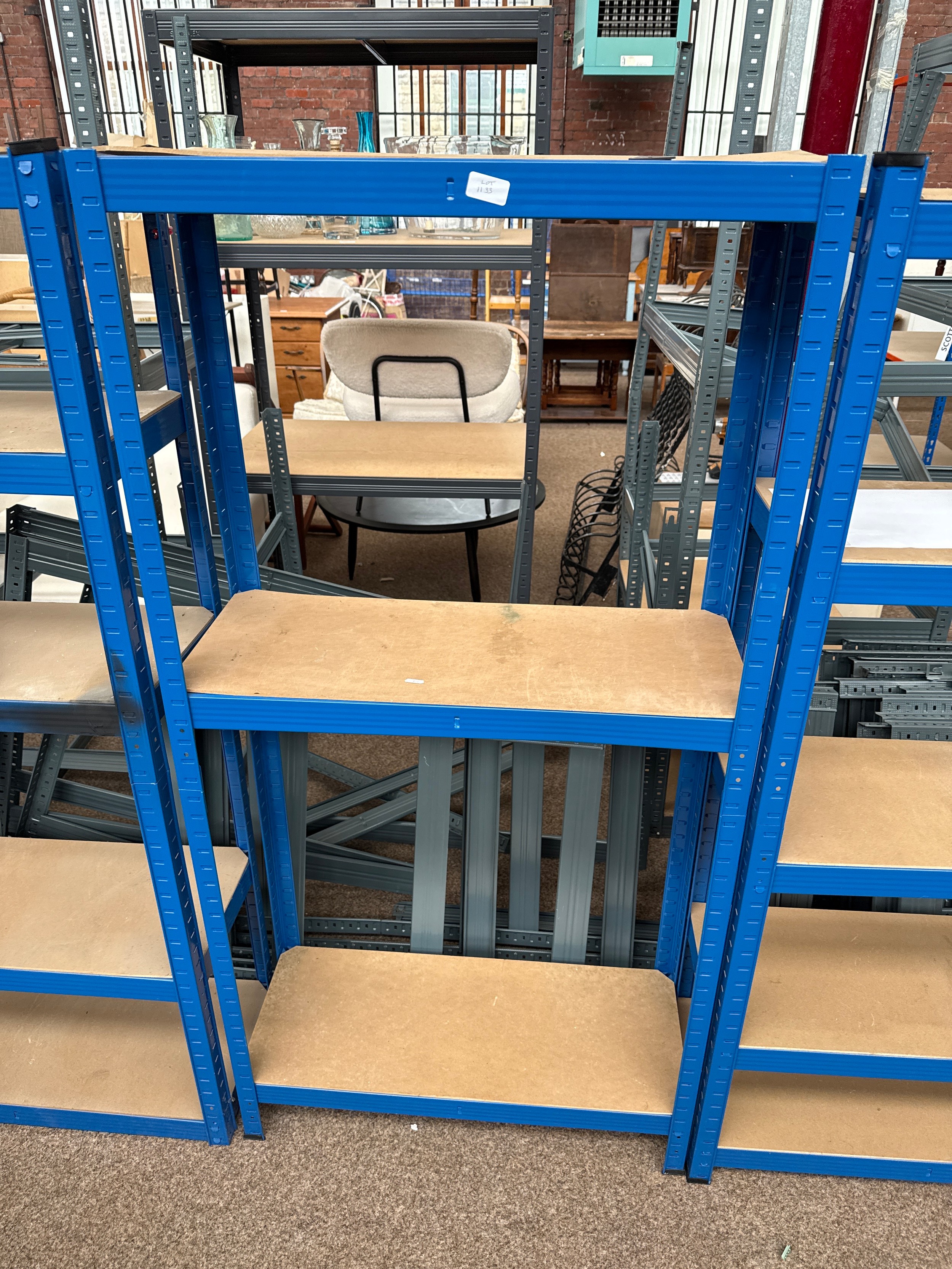 A small adjustable metal framed shelf stand