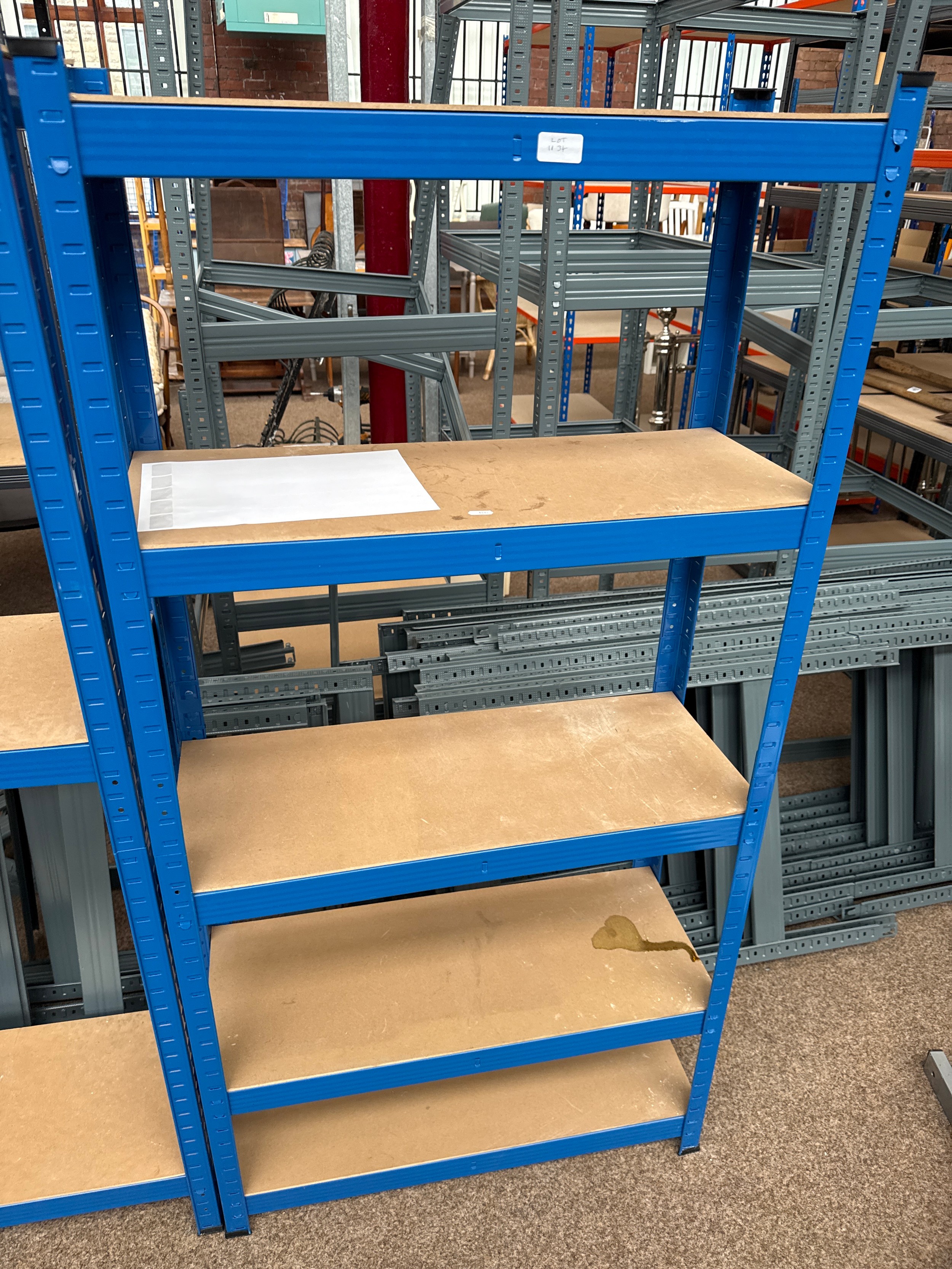 A small adjustable metal framed shelf stand