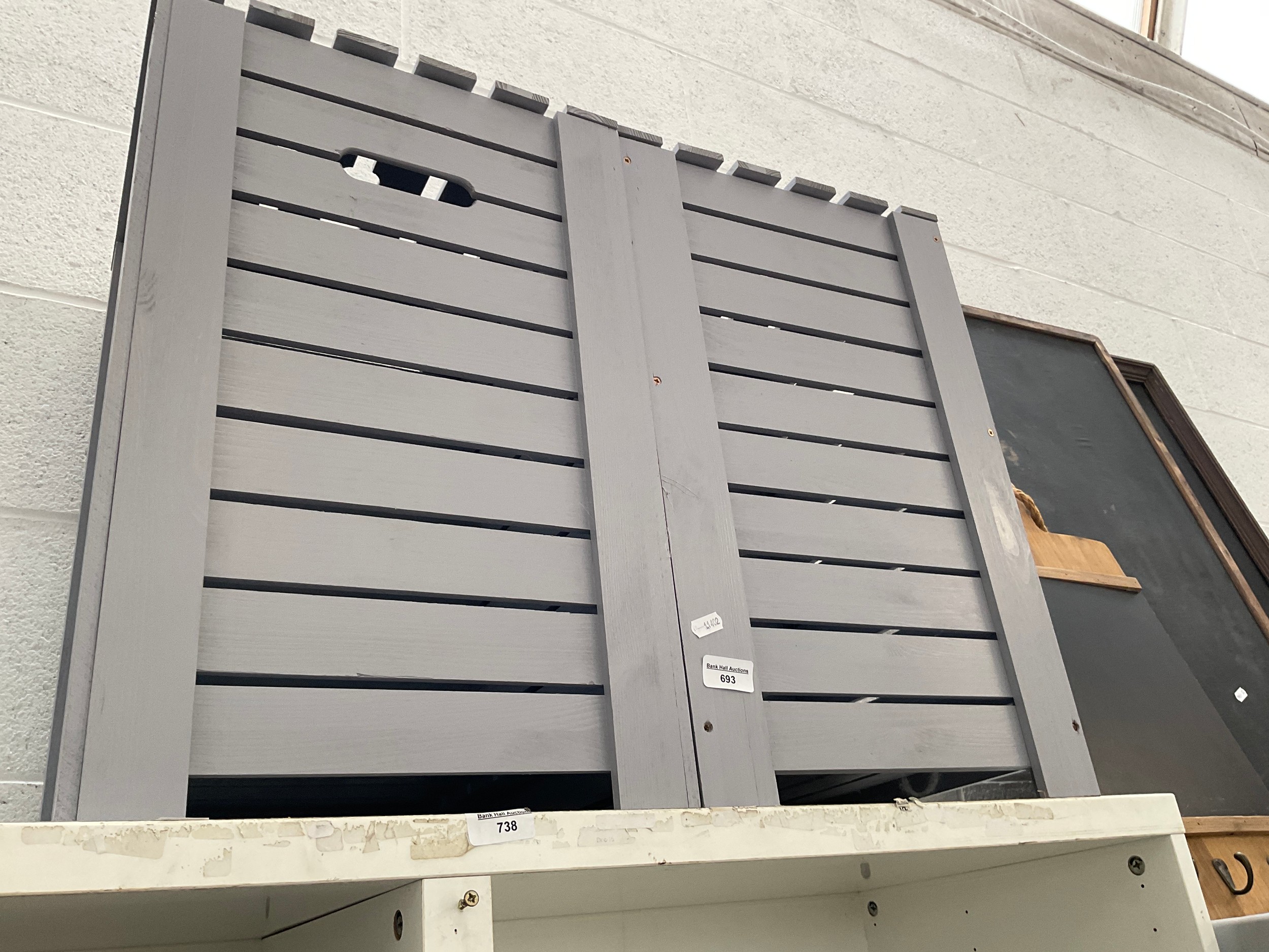 Two wooden laundry baskets