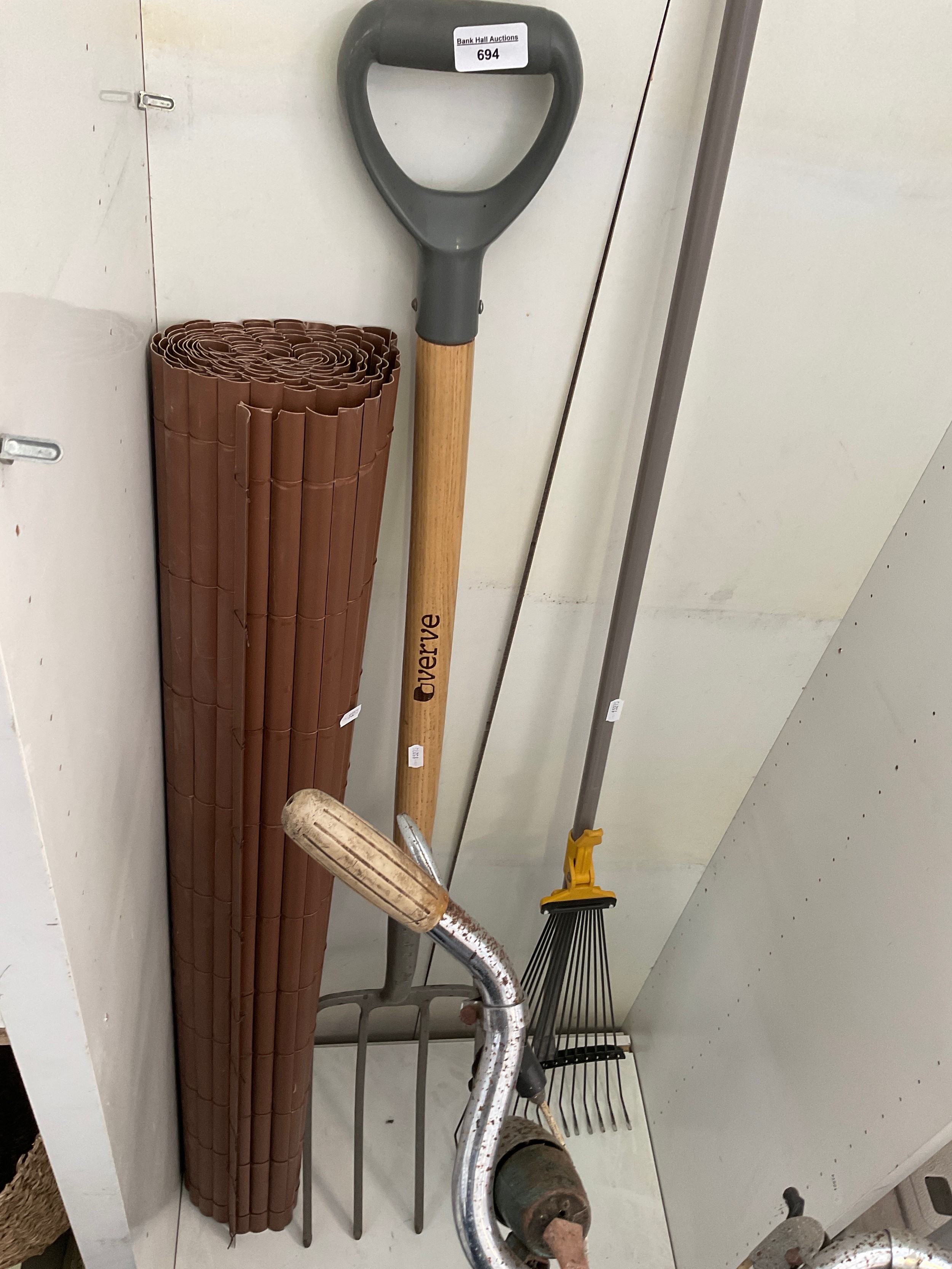 Garden fork, rake and window blind