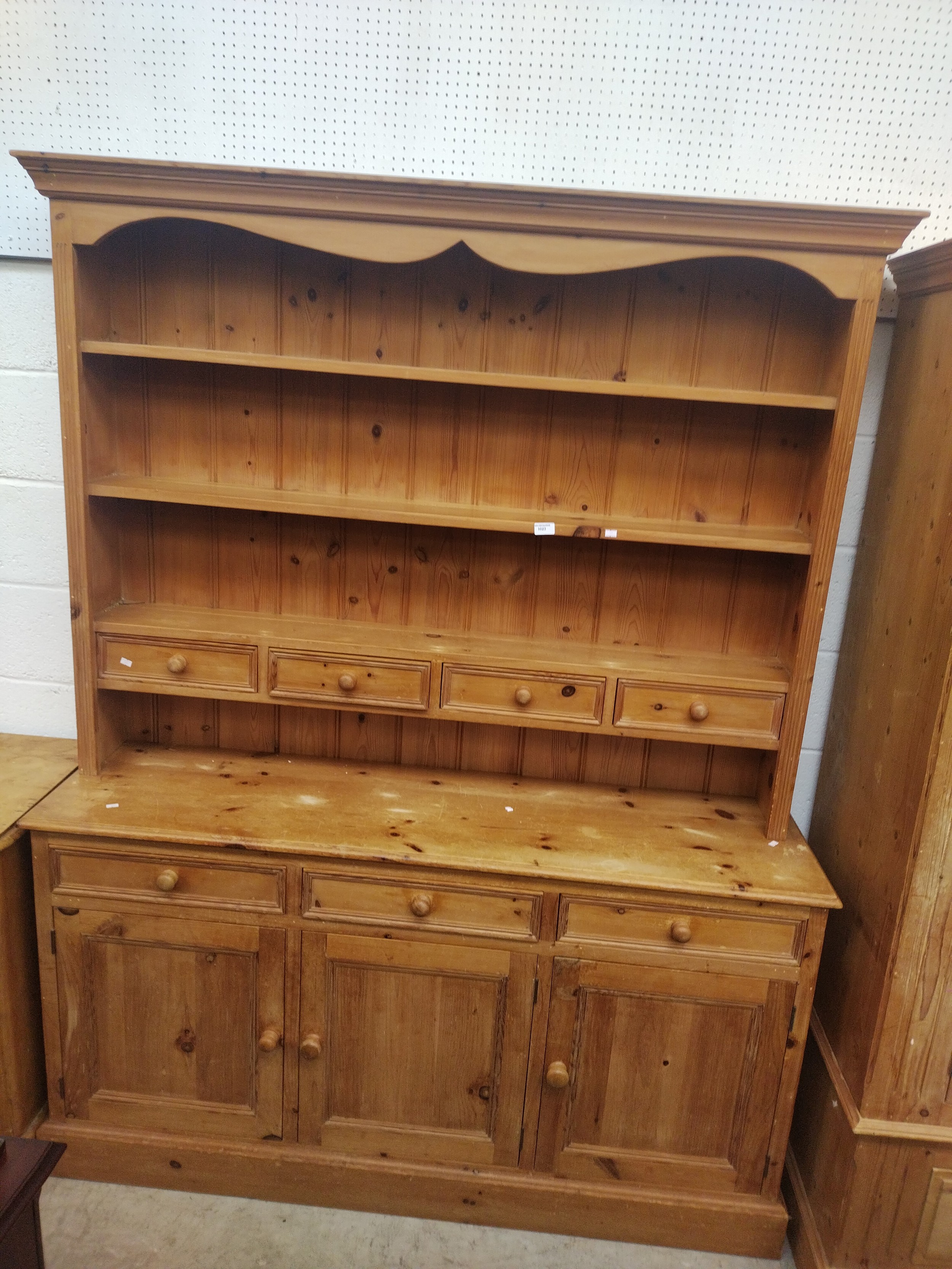 A large vintage pine Welsh Dresser with 4 drawer and cupboard base