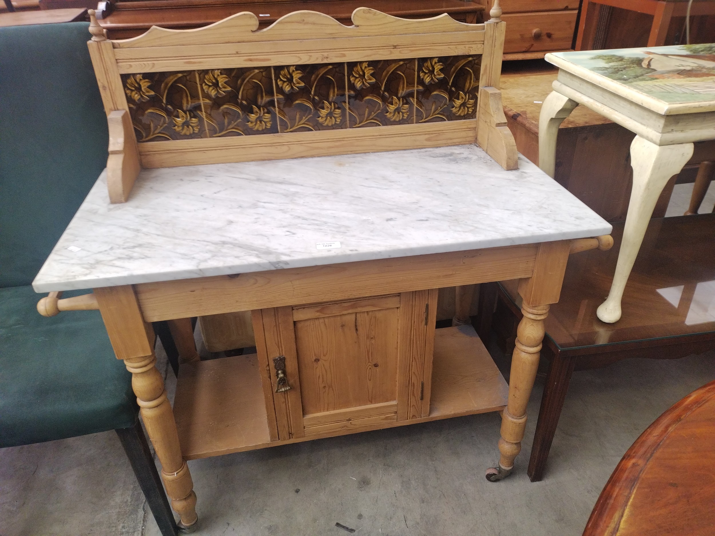 A vintage pine marble topped washstand with tiled upstand