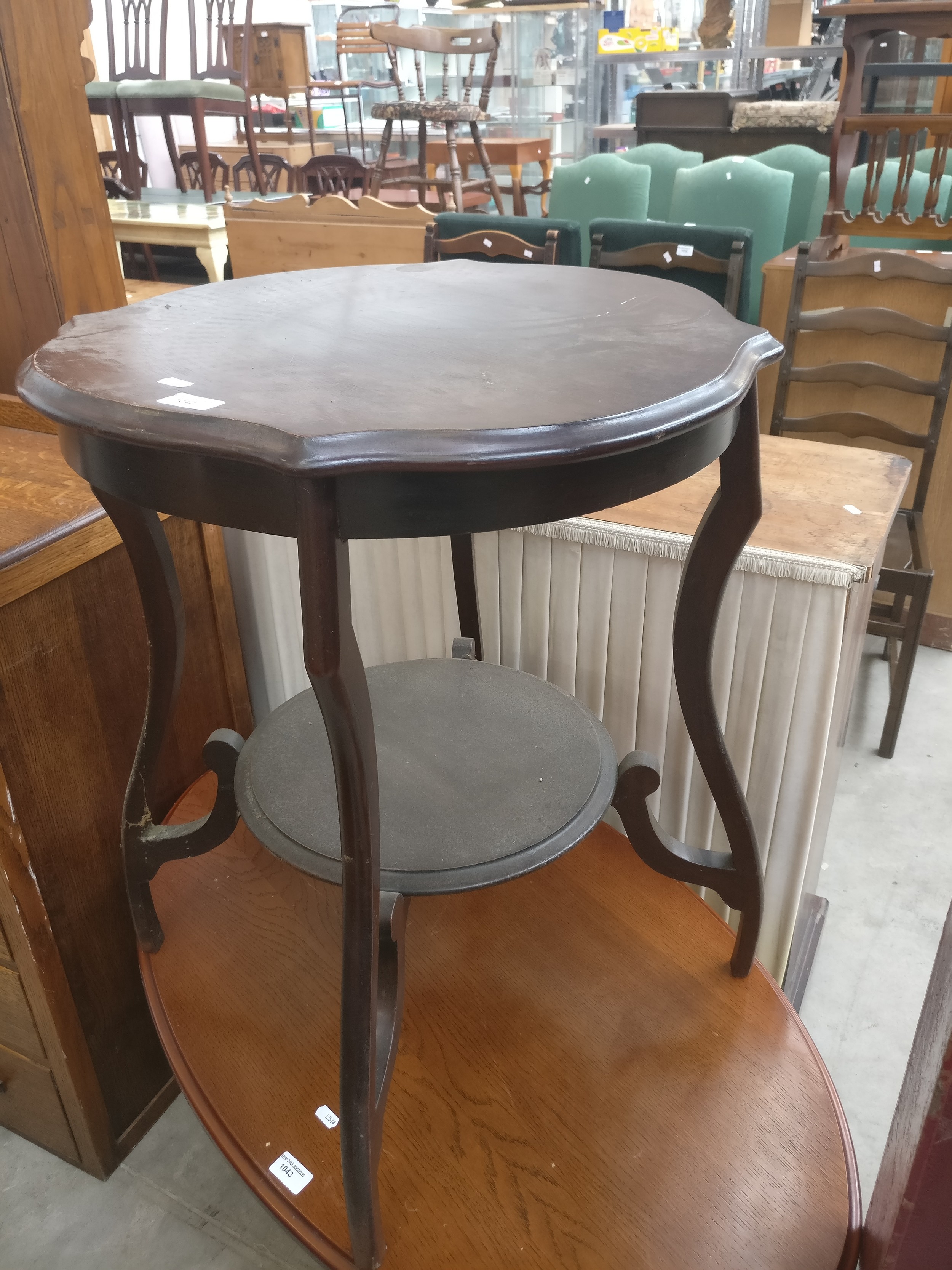 A vintage mahogany 2 tier window table