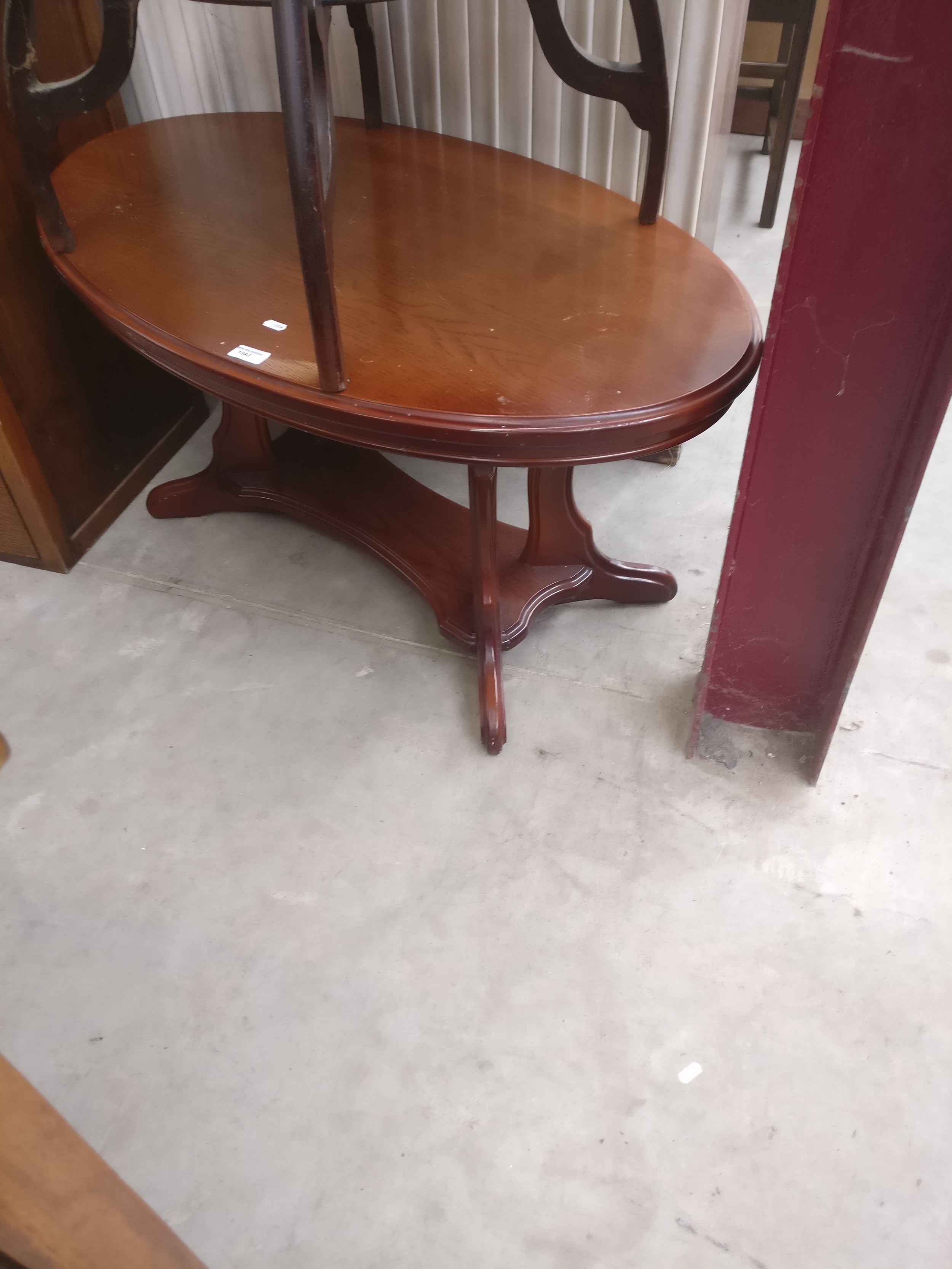 A vintage oak oval coffee table