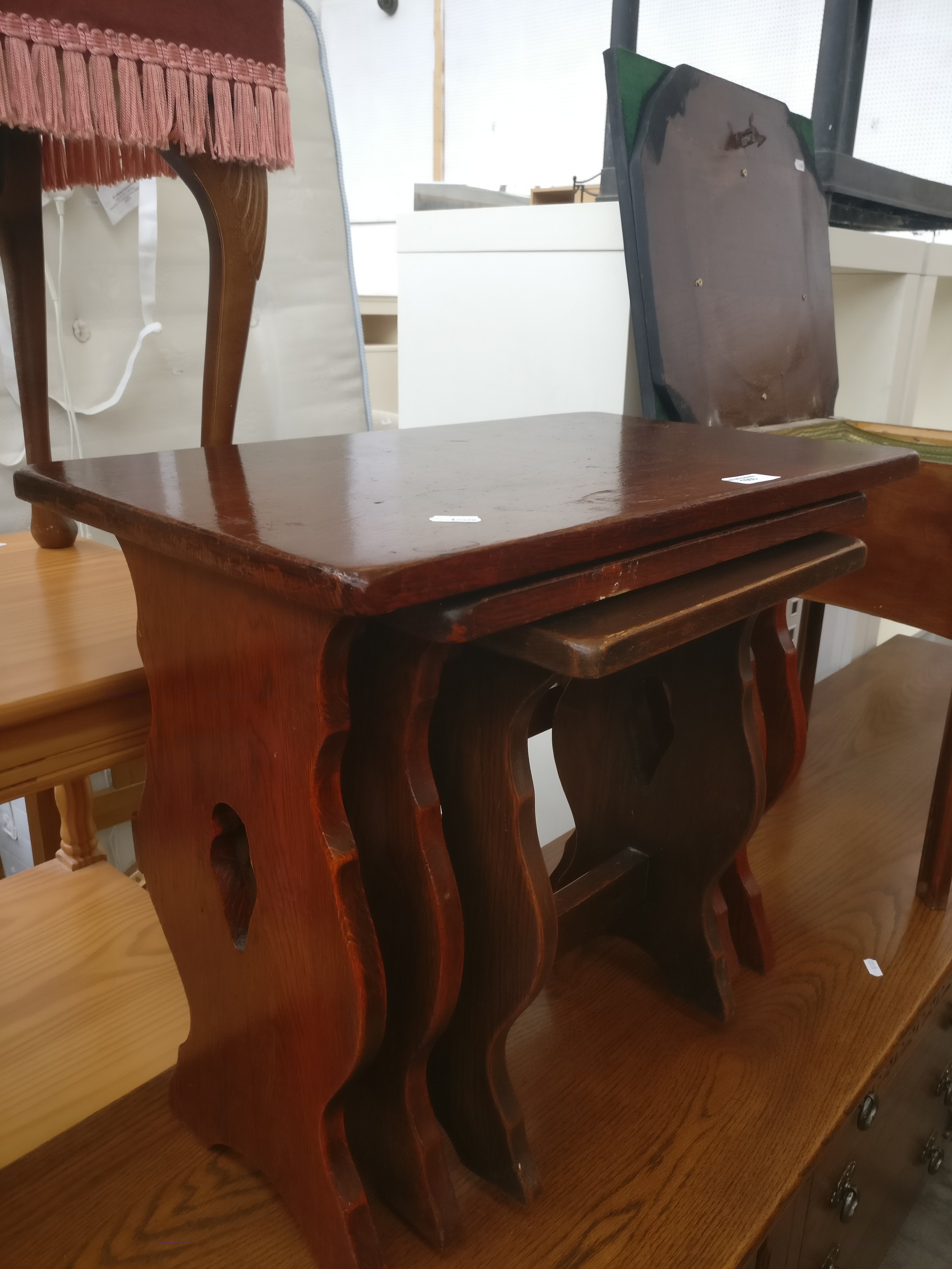 A vintage nest of 3 solid oak occasional tables