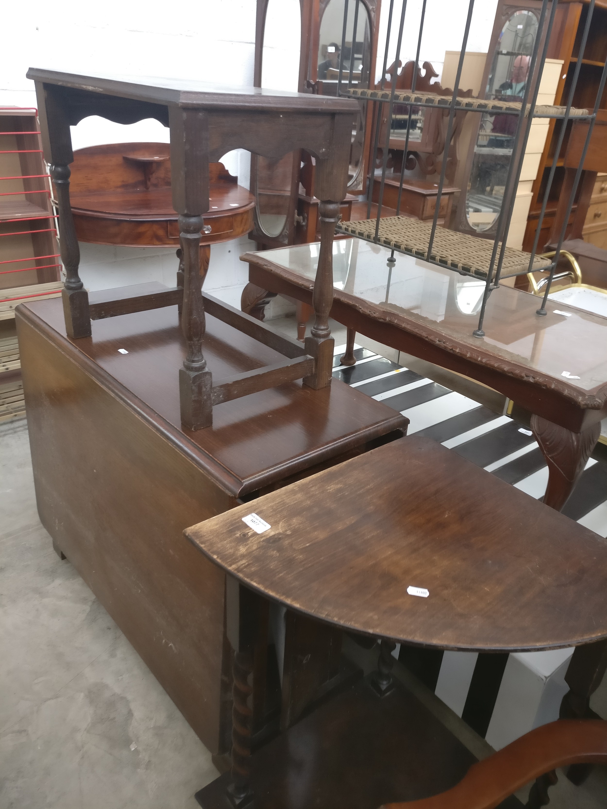 A vintage corner table with Barley Twist supports