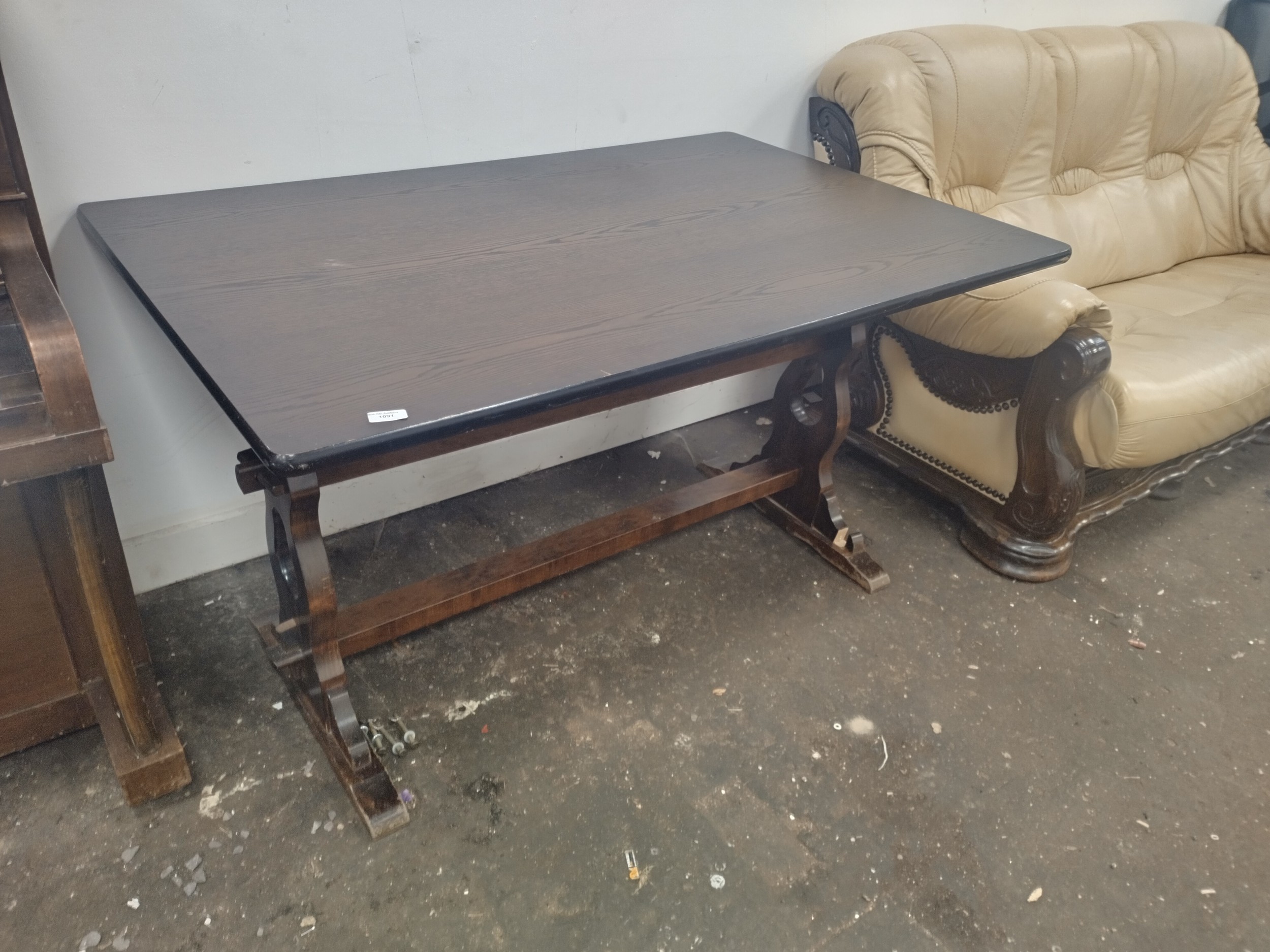 A vintage refectory style dining table - damage to one foot
