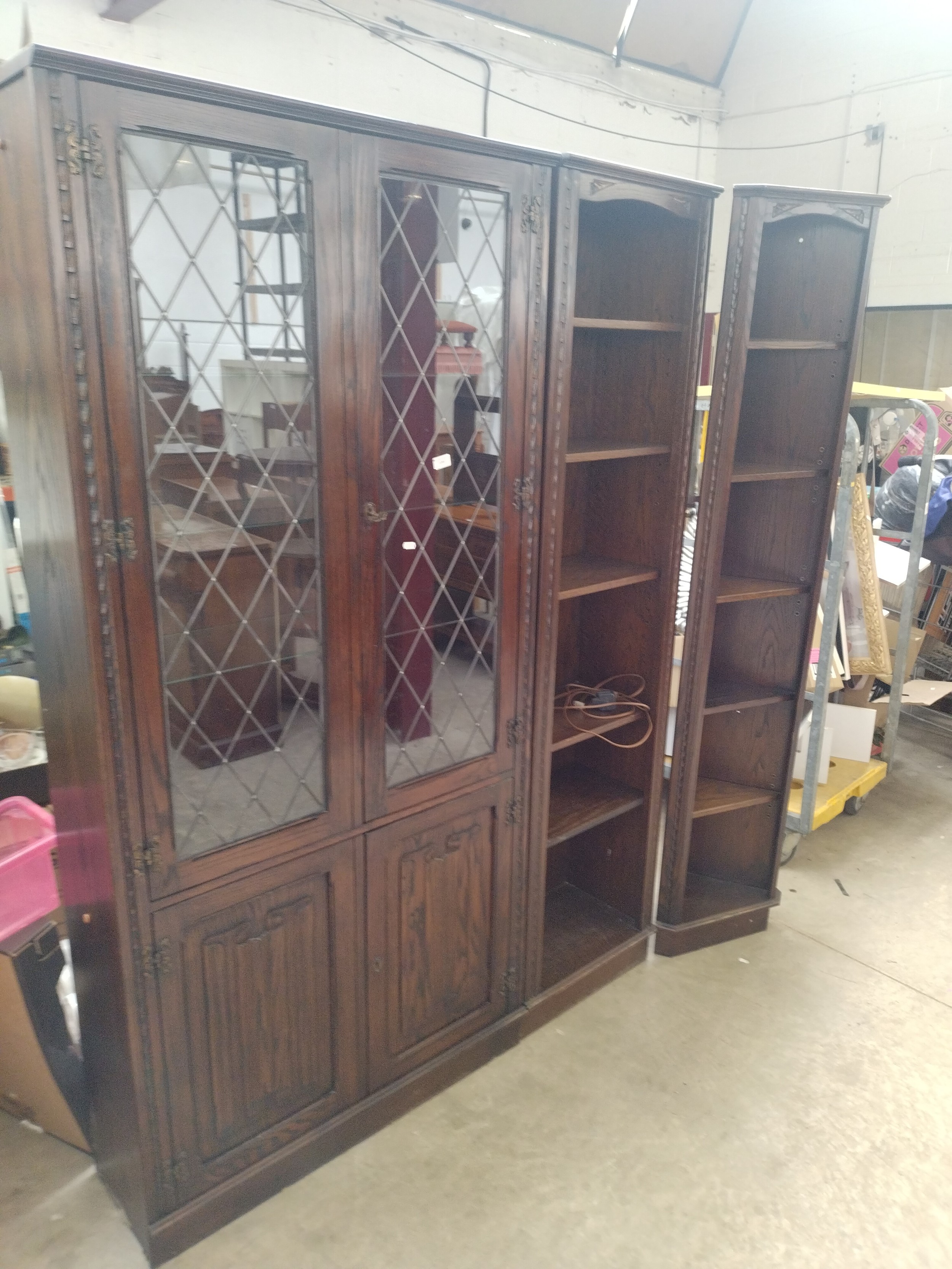 A large vintage carved oak 3 x part wall unit set with lead glazed cabinet