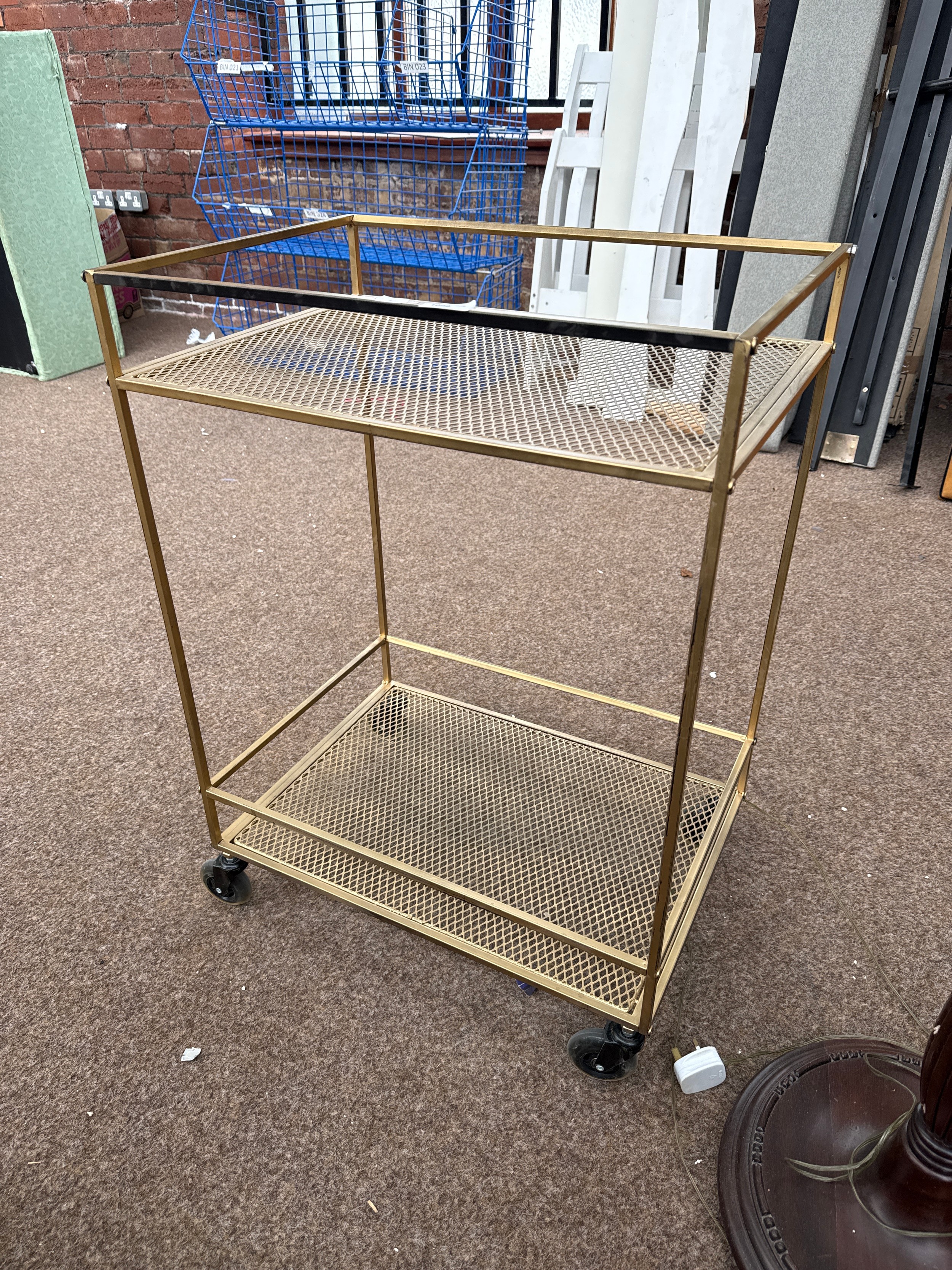 A vintage 2 tier gilt metal trolley