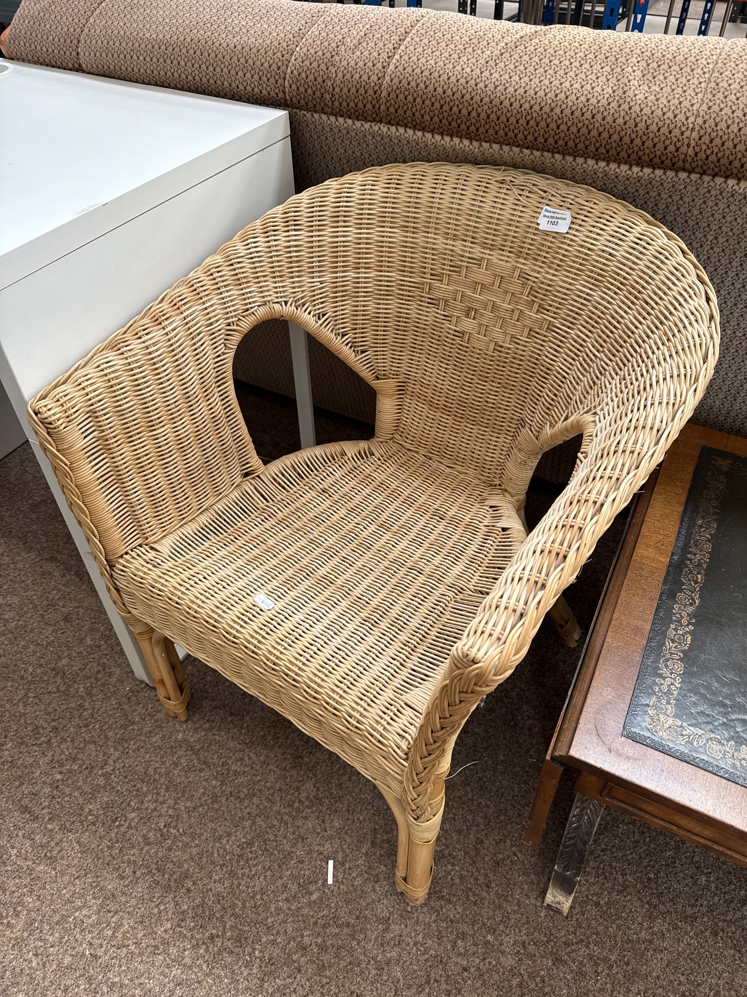 A vintage wicker basket chair