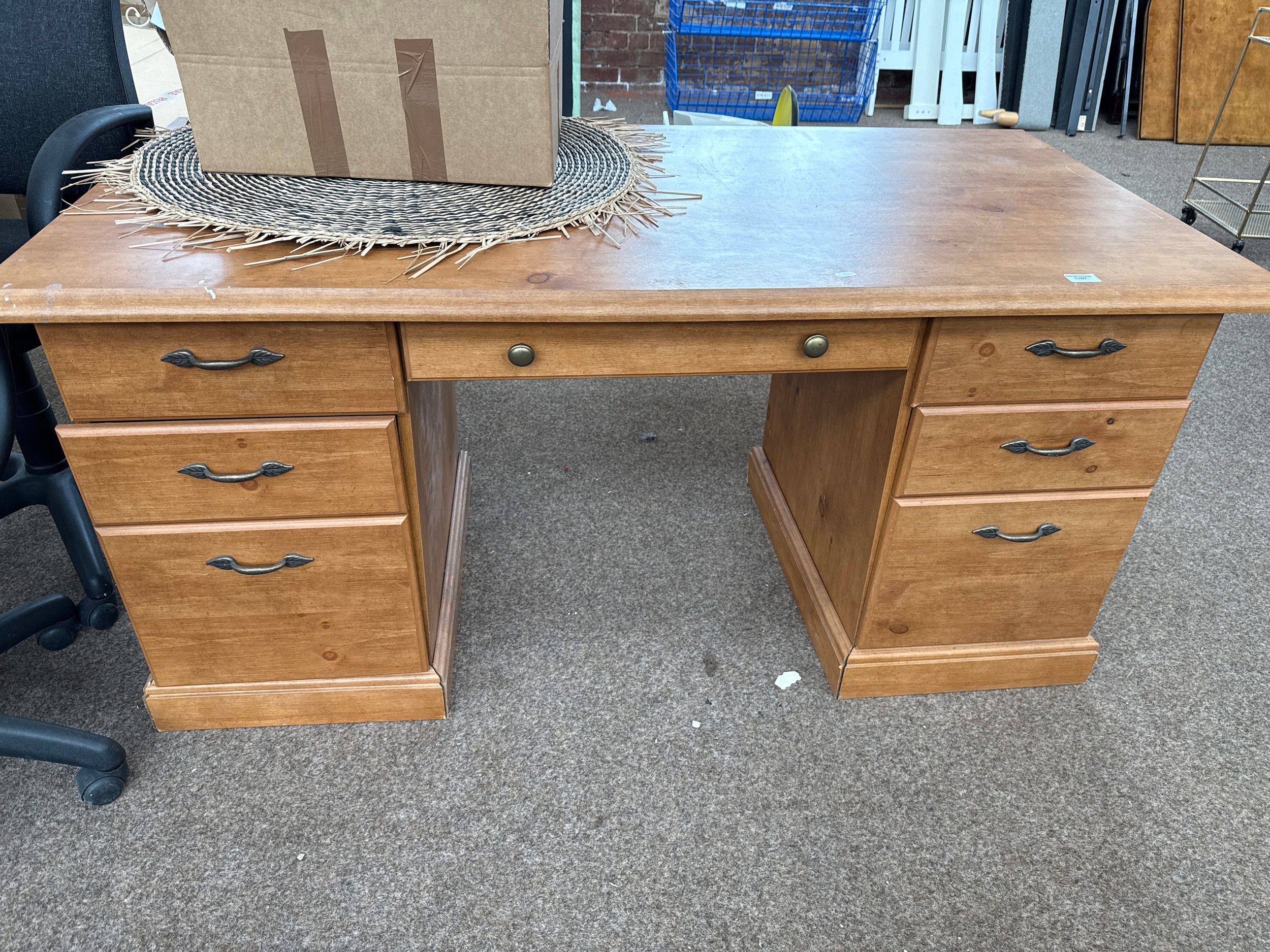 A large modern 7 drawer desk