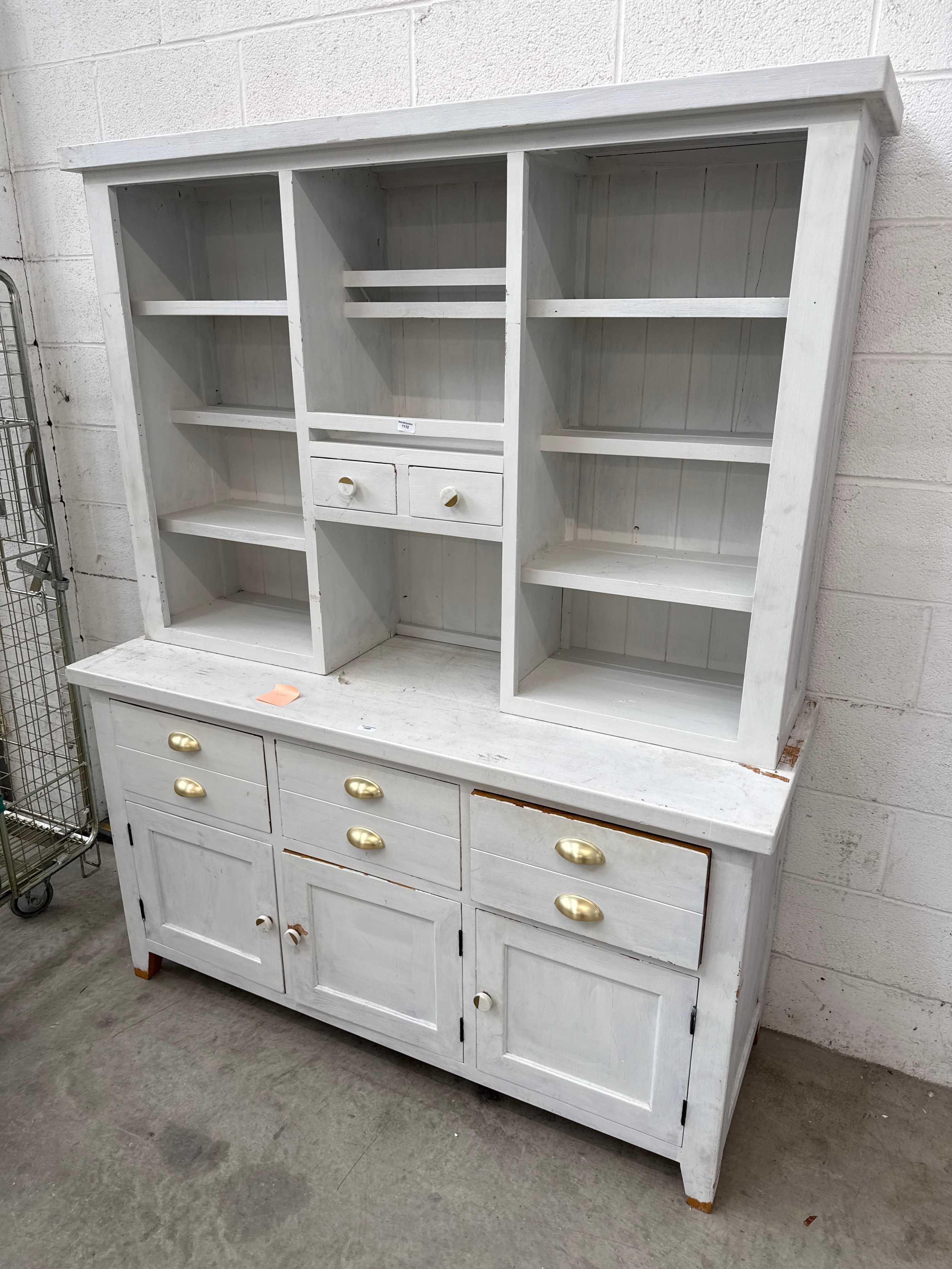 A large painted vintage dresser with 3 drawer base