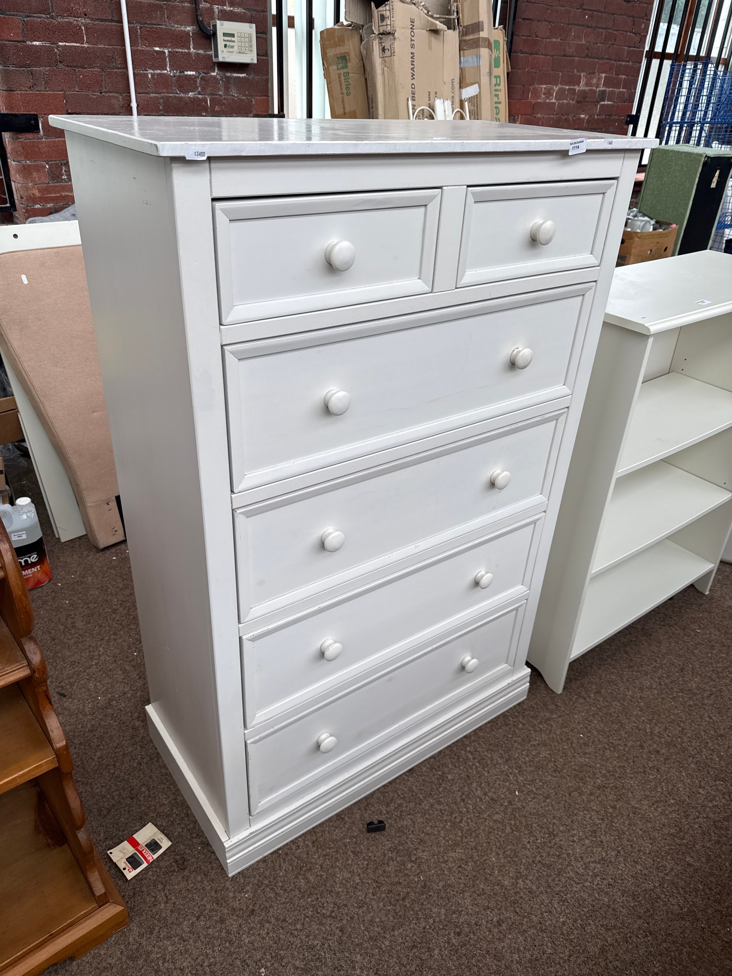 A large white 2 over 4 drawer chest