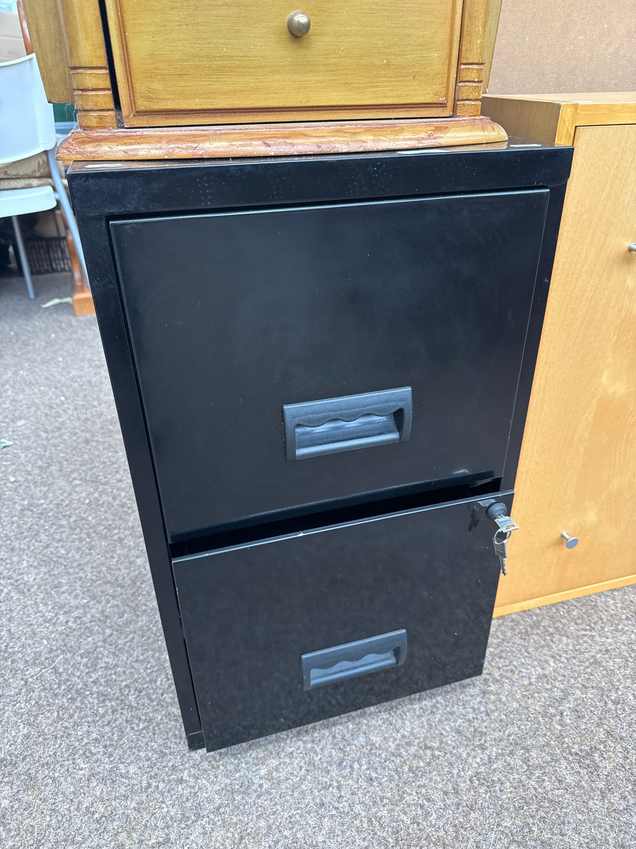 A lockable 2 drawer metal filing cabinet
