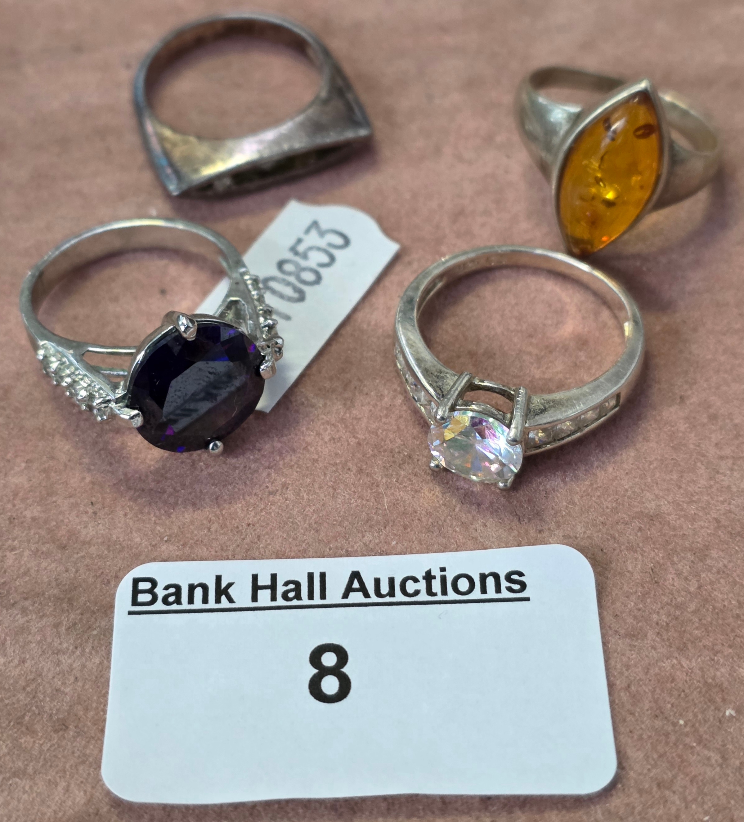Three 925 silver rings & another (4)