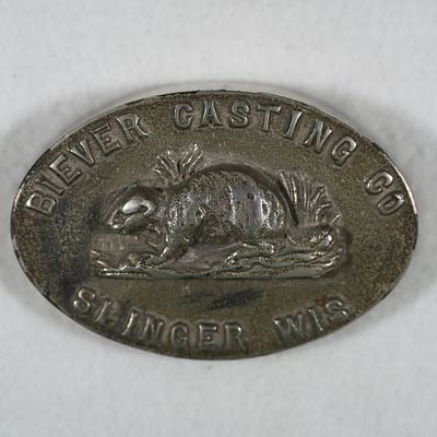 Biever Casting Co Advertising Paperweight. A Biever Casting Co Slinger Wisconsin paperweight 