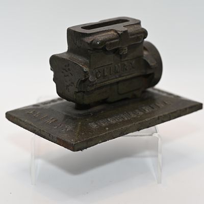Climax Engineering Company Clinton Iowa Advertising Paperweight. A painted cast iron paperweight 