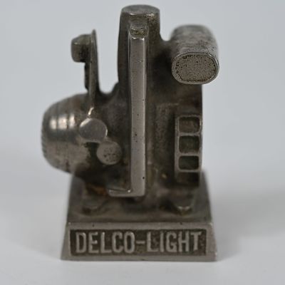 Delco-Light Generator Paperweight. Per online resources: Delco Light systems were a popular 