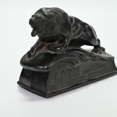 Lion Oil Company El Dorado Arkansas Advertising Paperweight. Front: Lion Oil Company El Dorado 