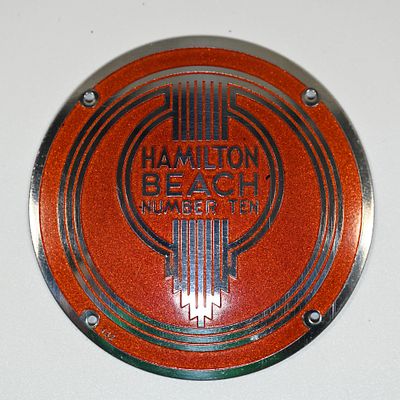 Hamilton Beach Number Ten Machine Plate. Enameled or painted brass. About 2 1/2 inches diameter 