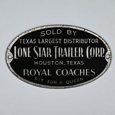 Lone Star Trailer Corp - Royal Coaches Dealer Plate. Painted steel or tin. About 2 1/8 H x 3 5/8 