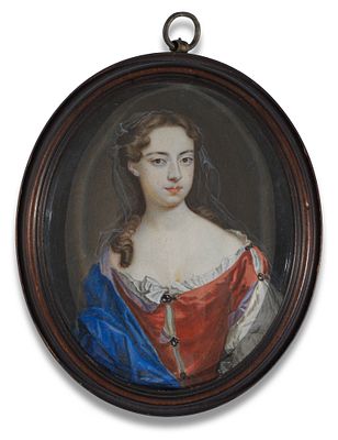 Christian Richter 1678–1732 Oval miniature portrait of a young woman in a red dress with a blue 