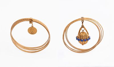 Two gold bangle braceletsOne of five separate strand bangles composed of faceted gold with 