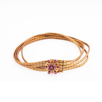 Retro gold and ruby floral braceletOf floral design, composed of four flexible frosted strands 